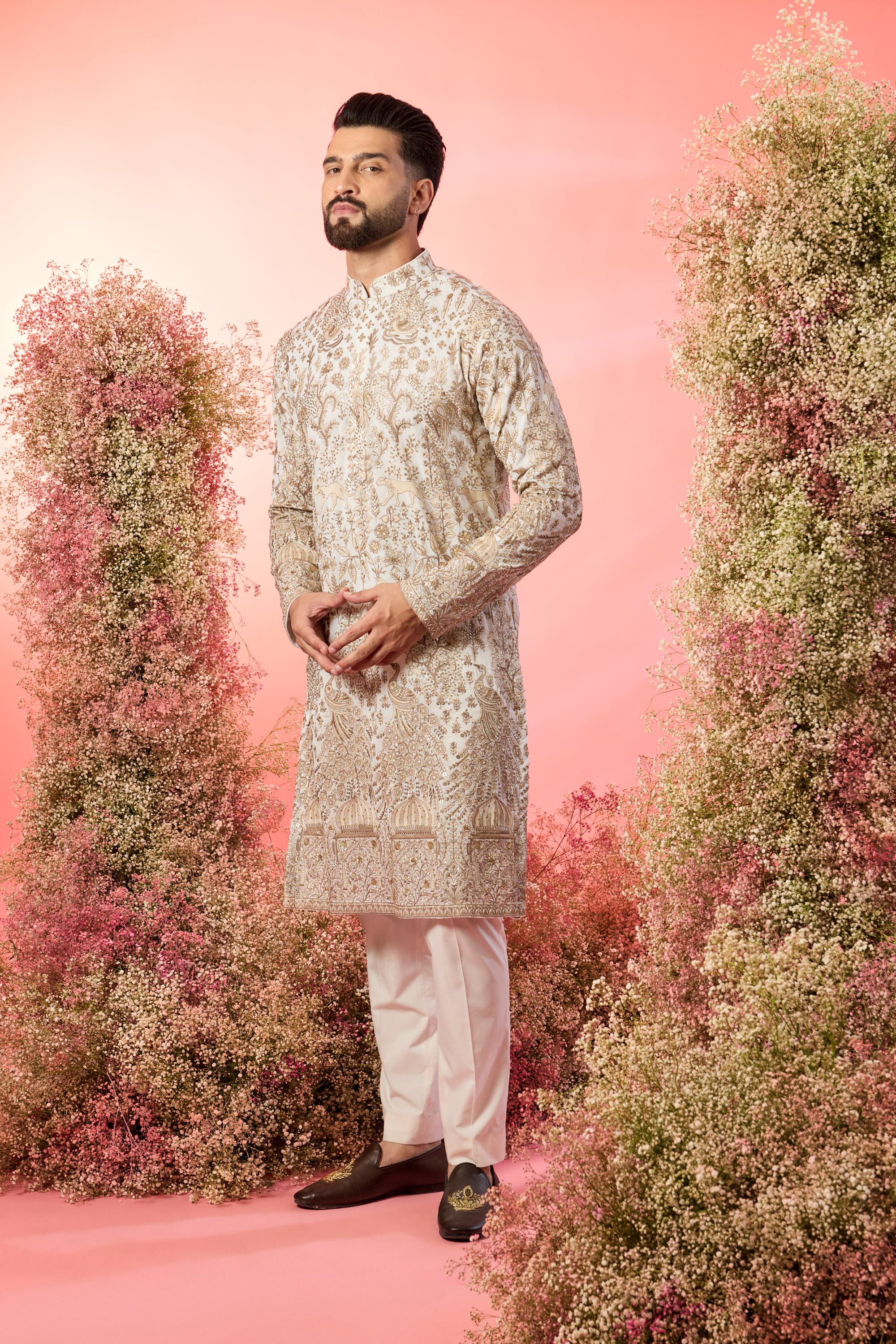 White zari kurta with inricate frlora and fauna figures