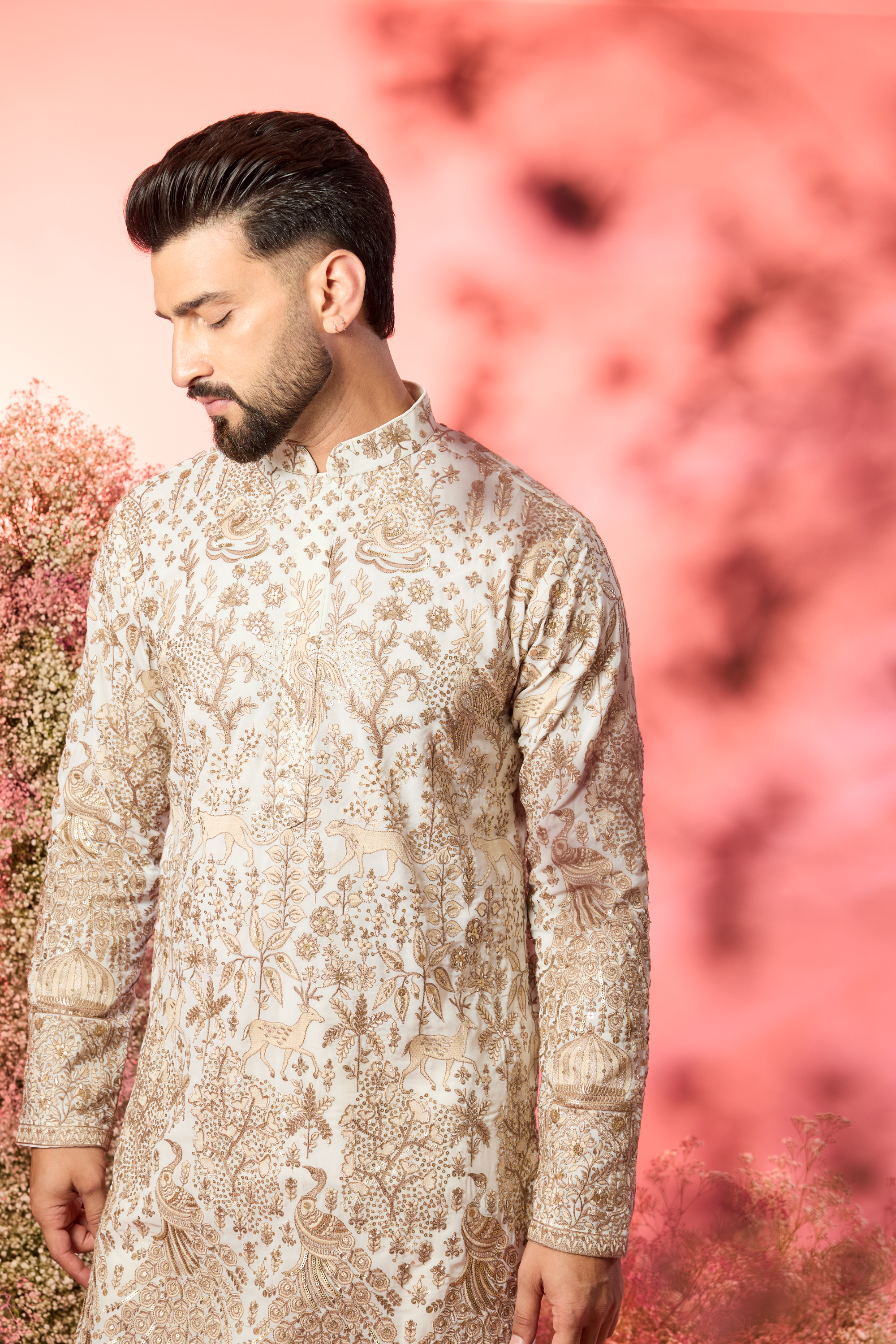 White zari kurta with inricate frlora and fauna figures