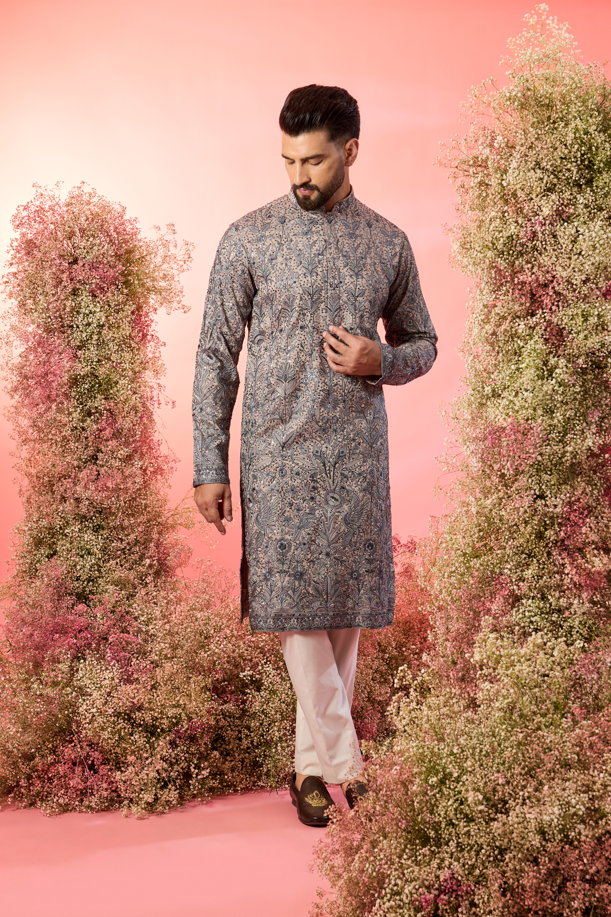 nude chikabkari kurta with intricate flora and fauna embroidery with blue thread work