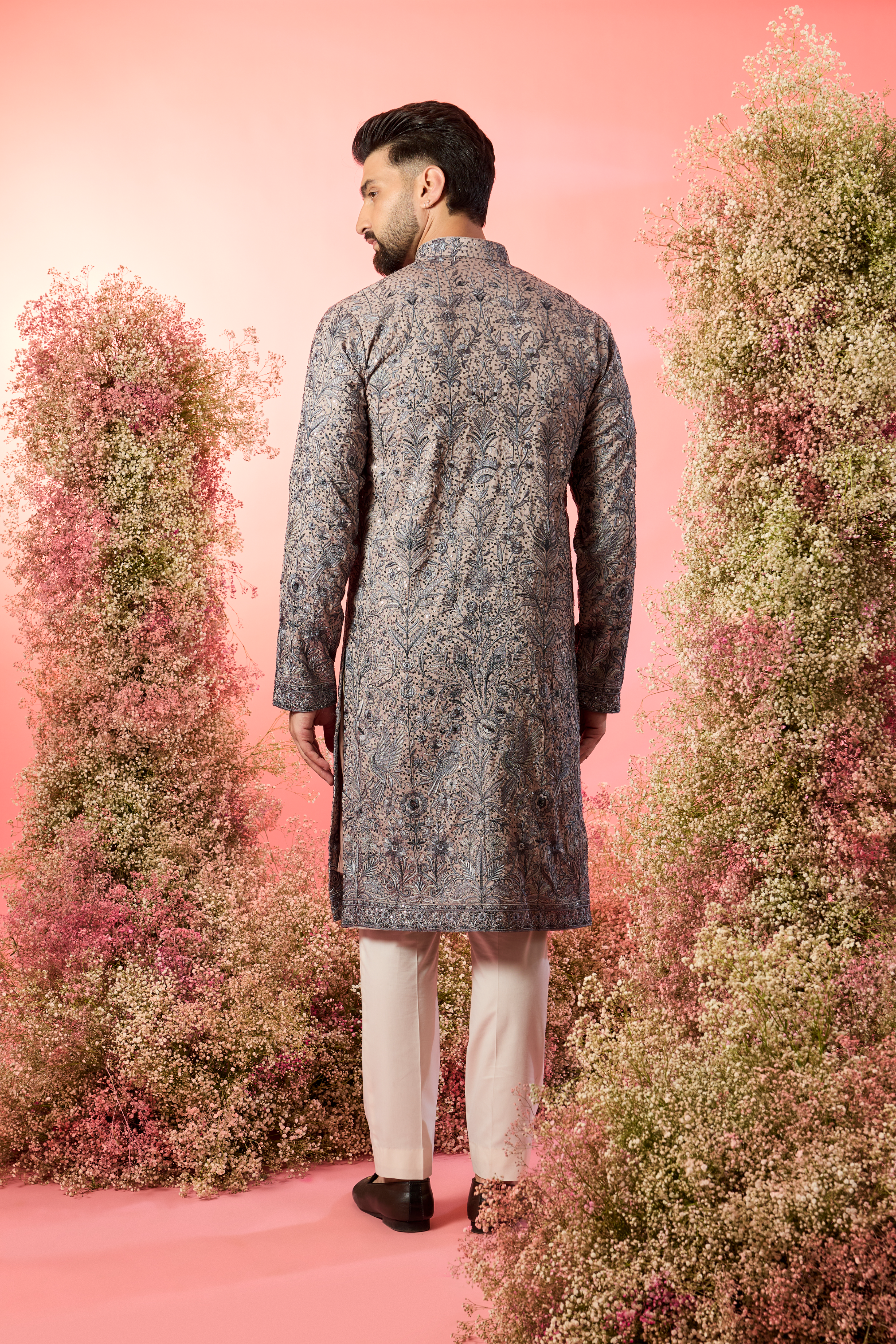 nude chikabkari kurta with intricate flora and fauna embroidery with blue thread work