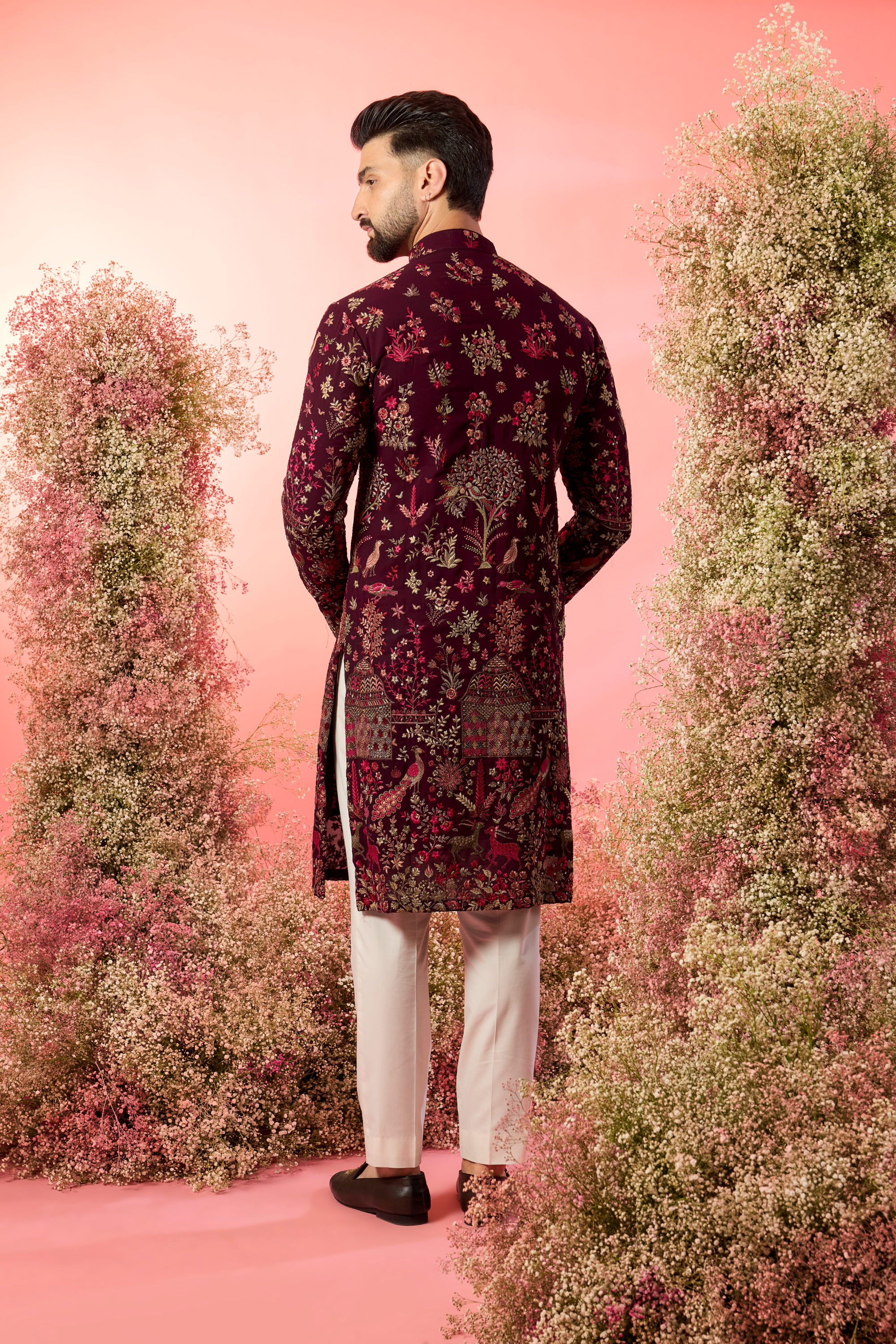 wine chikankari kurta with intricate flora and fauna figures