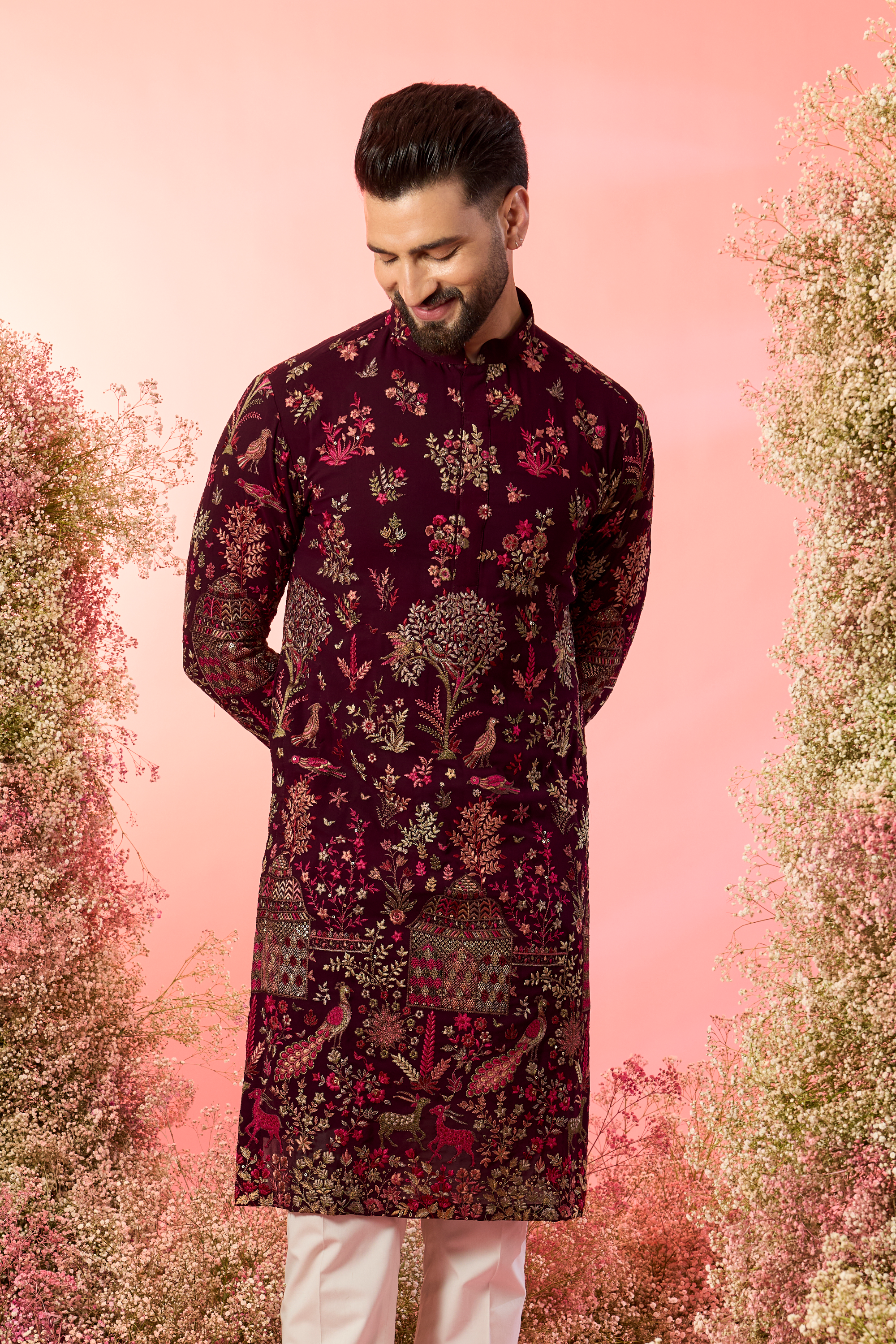 wine chikankari kurta with intricate flora and fauna figures