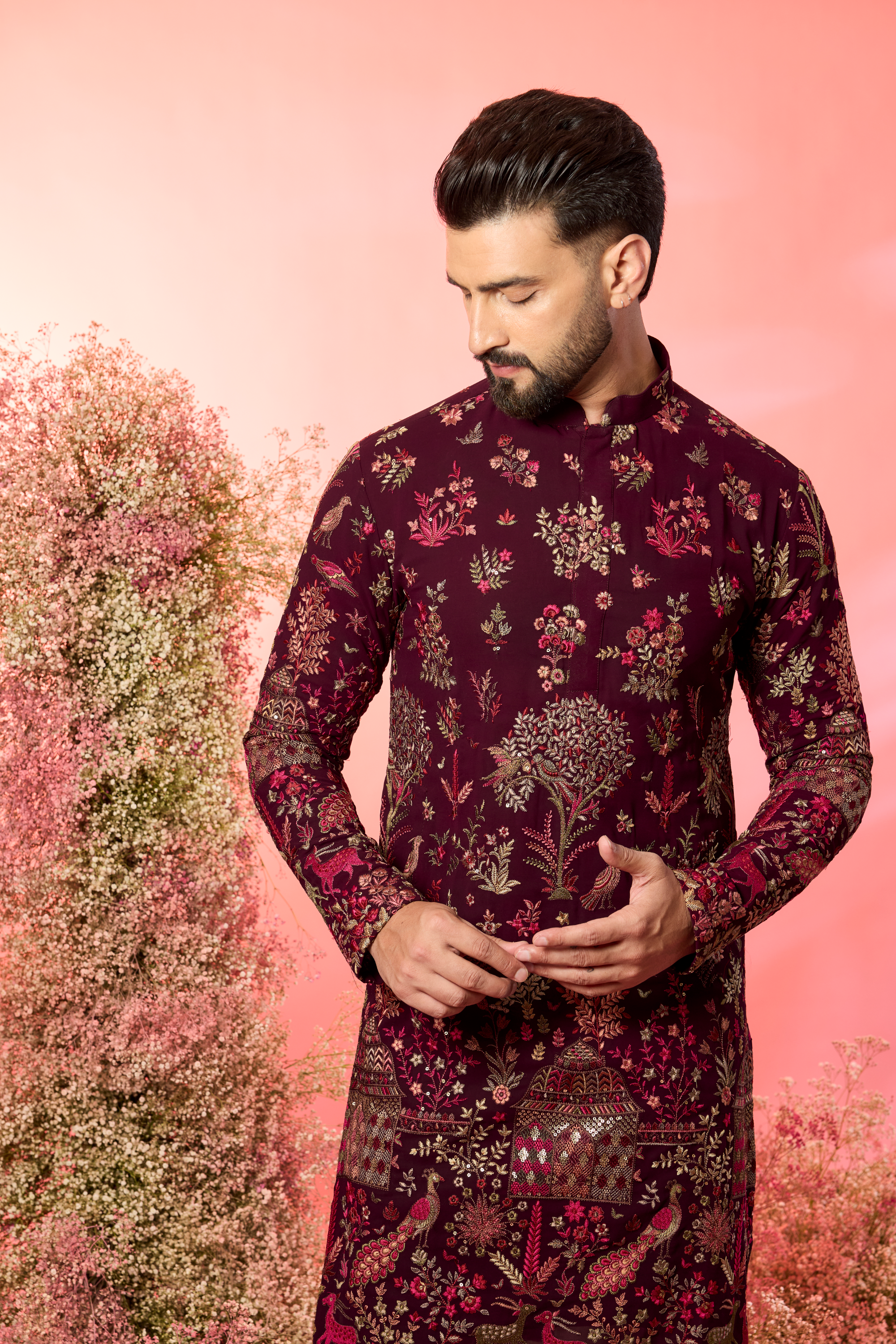 wine chikankari kurta with intricate flora and fauna figures