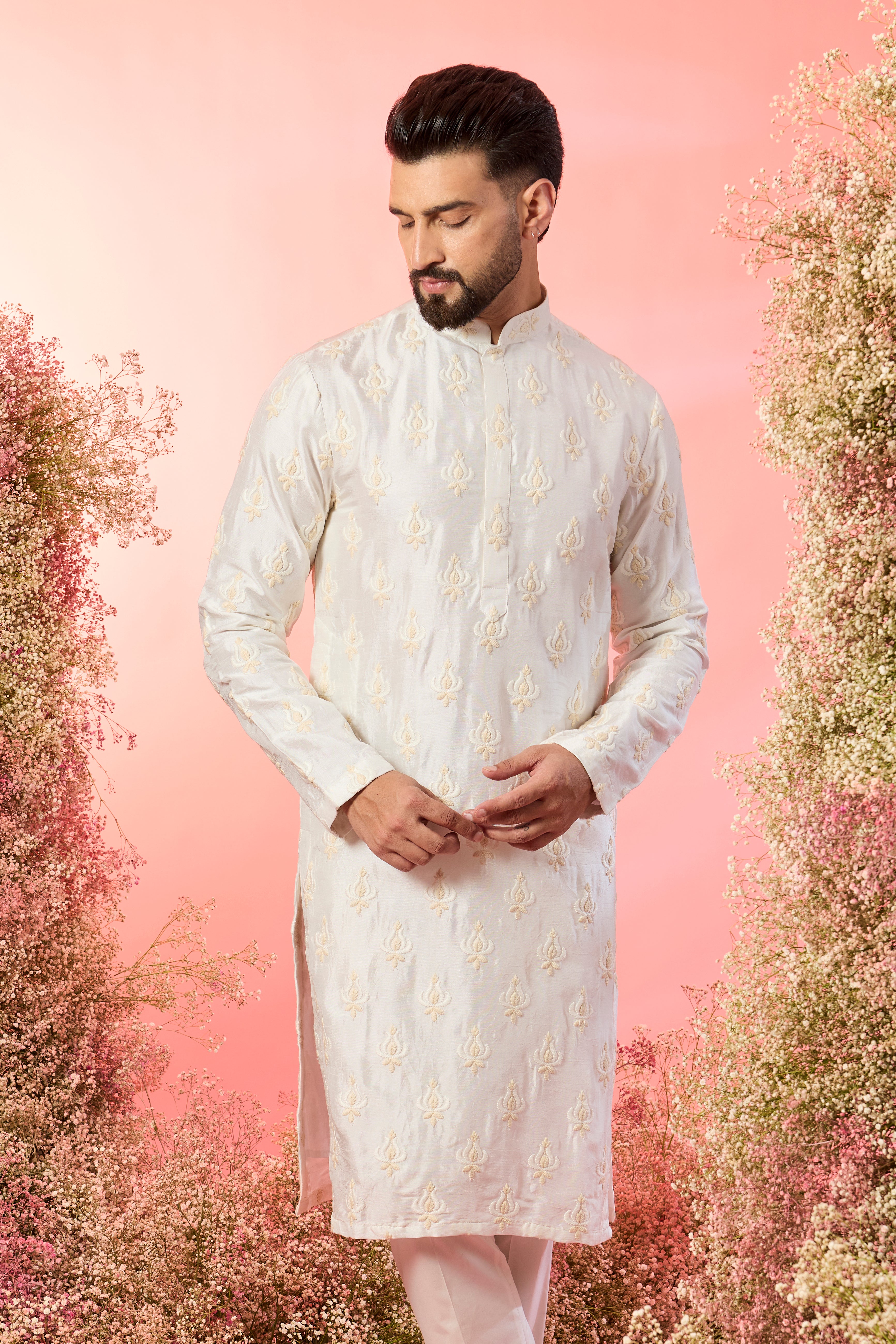 ivory chikankari kurta with delicate thread work details