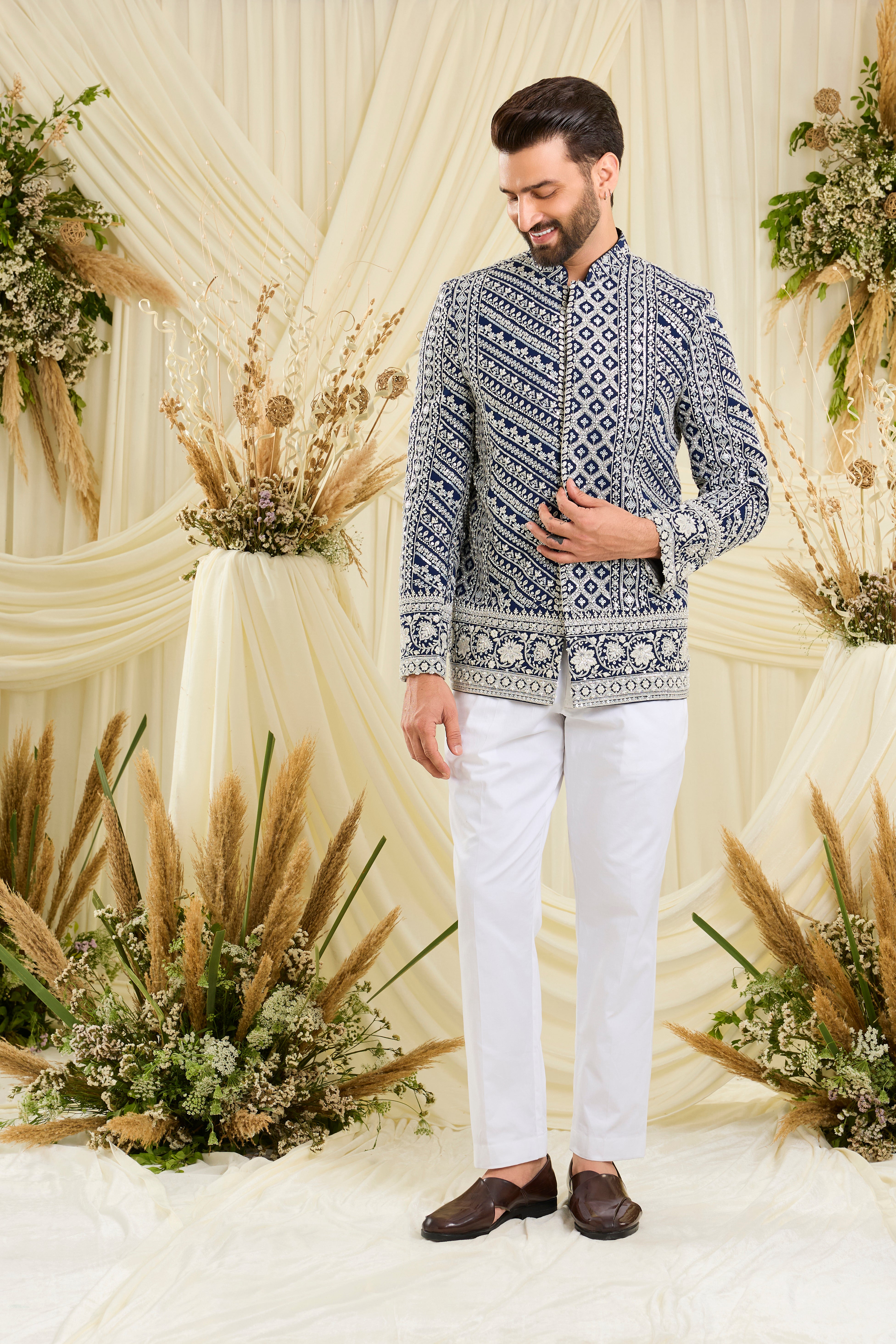 Royal blue bandgala with intricate white cut dana work and delicate sequins, crafted for a bold, ultra-luxurious statement.