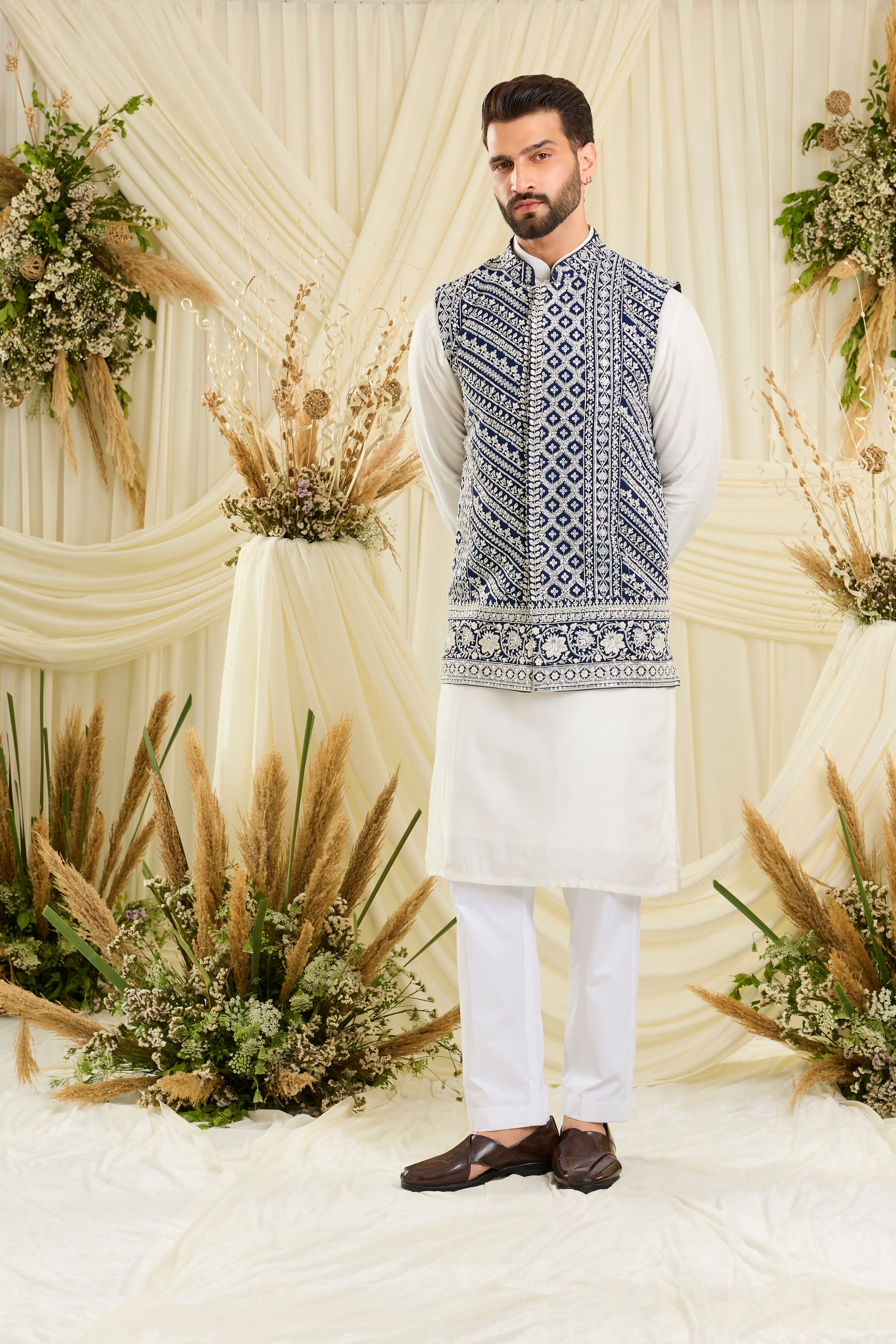 Royal blue nehru jacket with intricate white cut dana work and delicate sequins, crafted for a bold, ultra-luxurious statement.