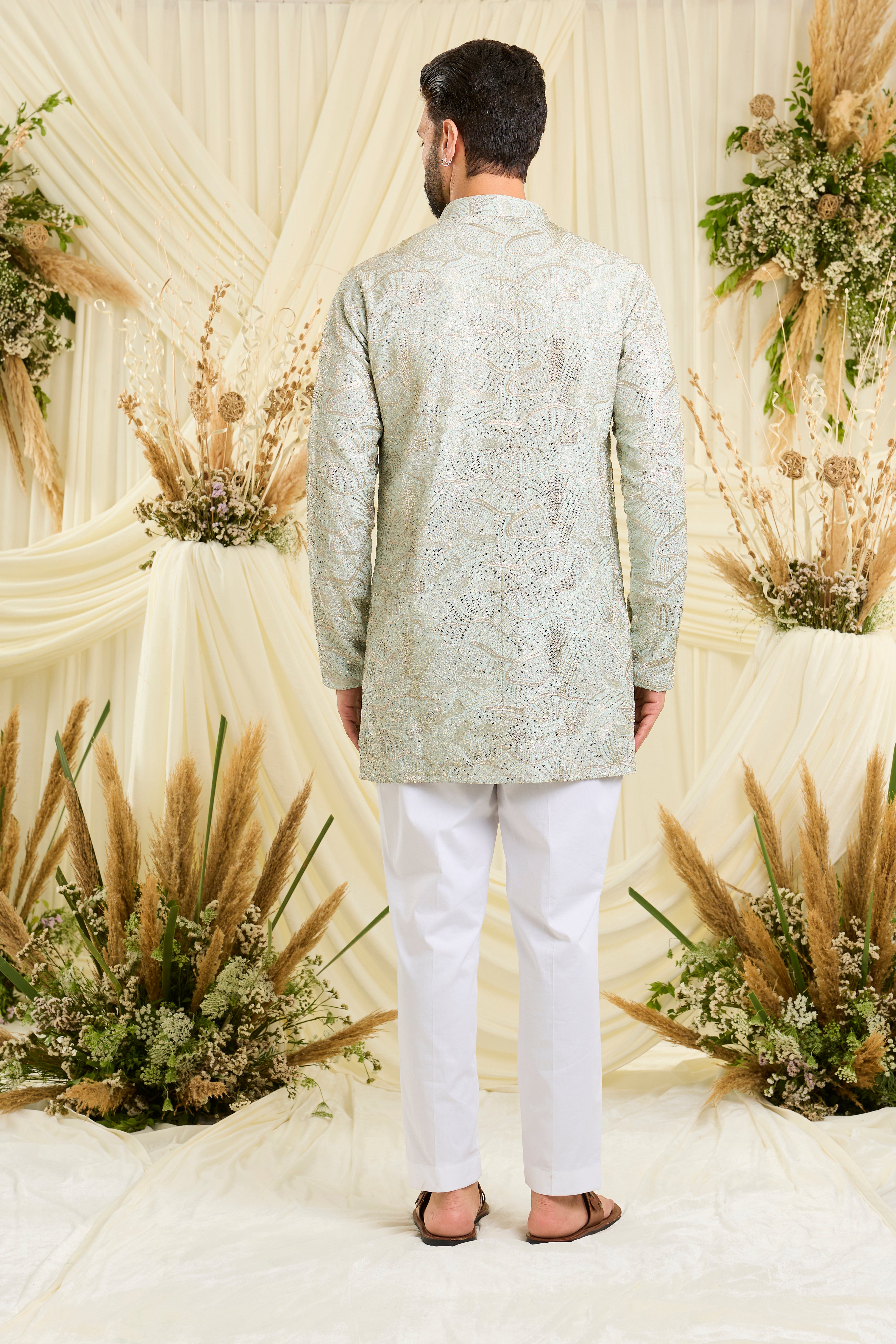 Pastel aqua blue sequined short kurta with an abstract design — fresh, luminous, and perfect for elevated day occasions.