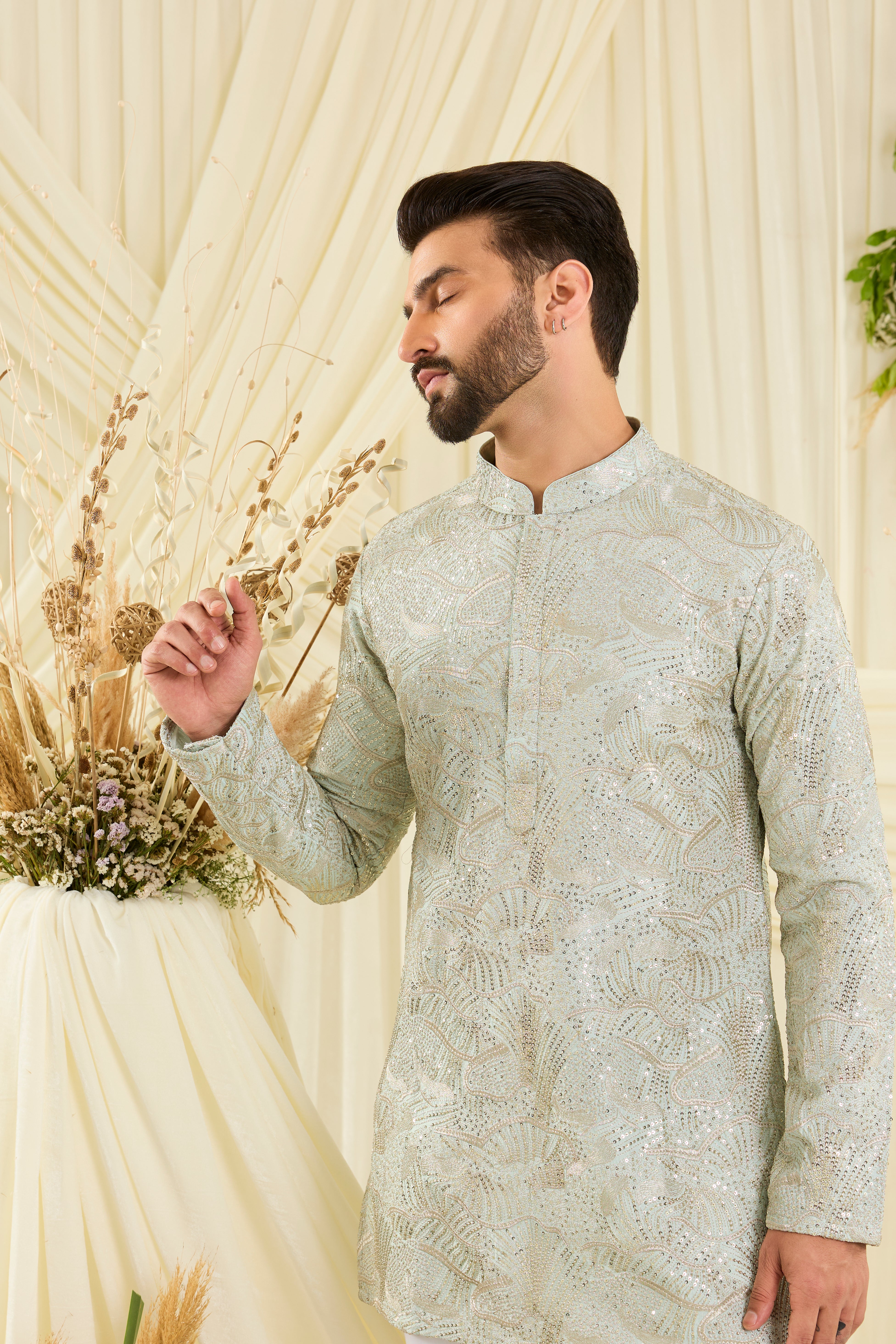 Pastel aqua blue sequined short kurta with an abstract design — fresh, luminous, and perfect for elevated day occasions.