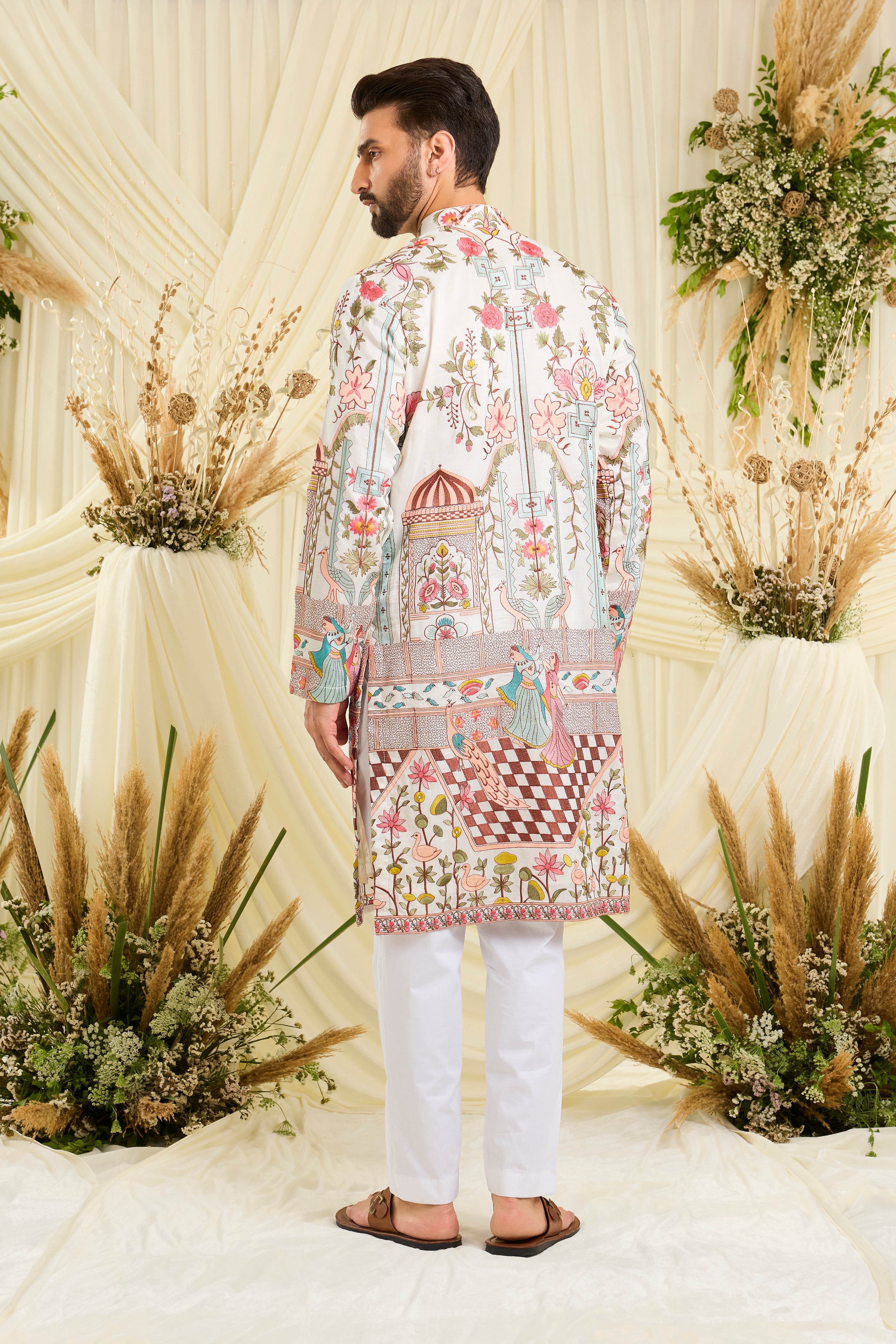 Opulent silk kurta with Mughal darbars, peacocks, florals, and dancing royals — a masterpiece of imperial artistry.