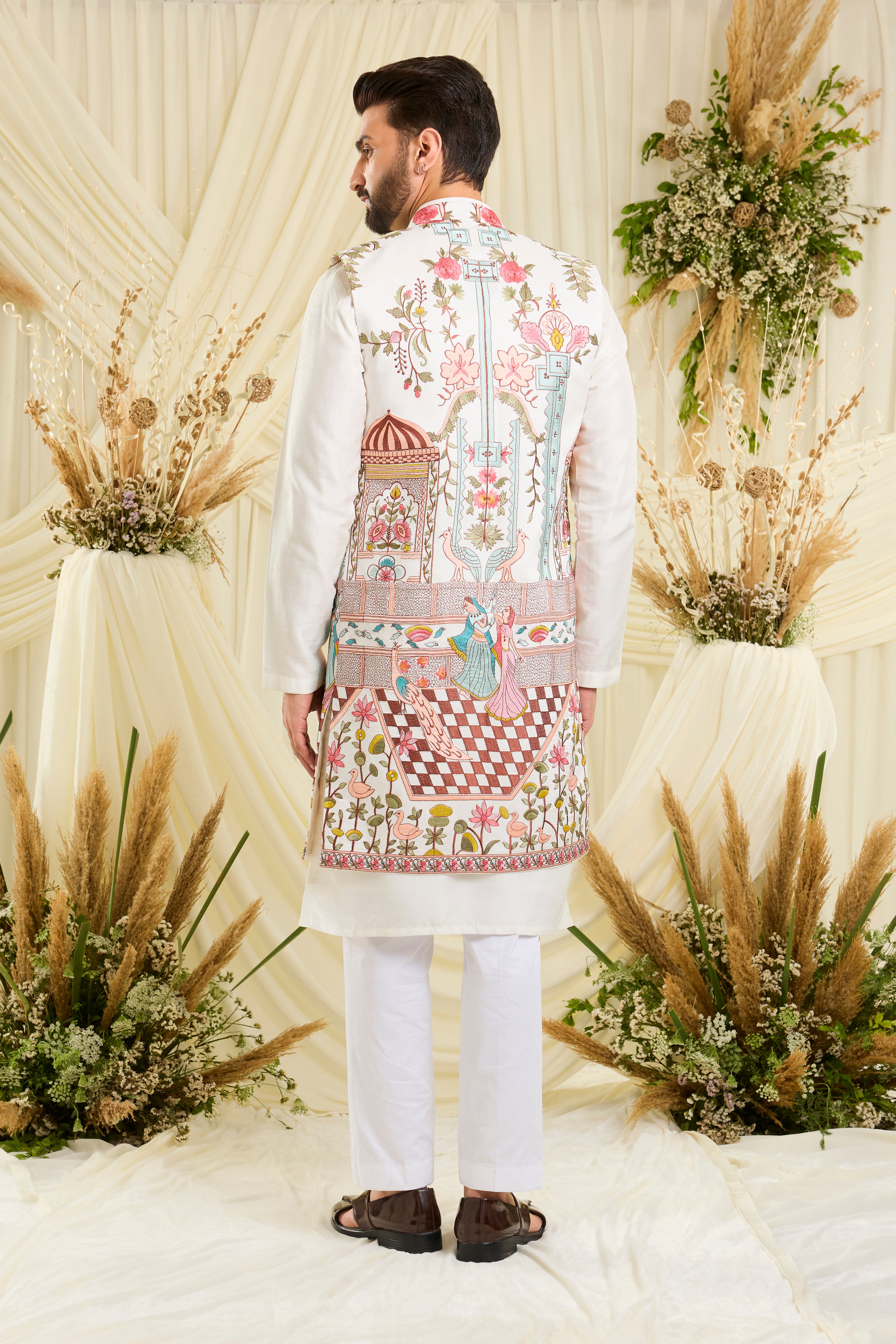 Opulent silk long open jacket with Mughal darbars, peacocks, florals, and dancing royals — a masterpiece of imperial artistry.