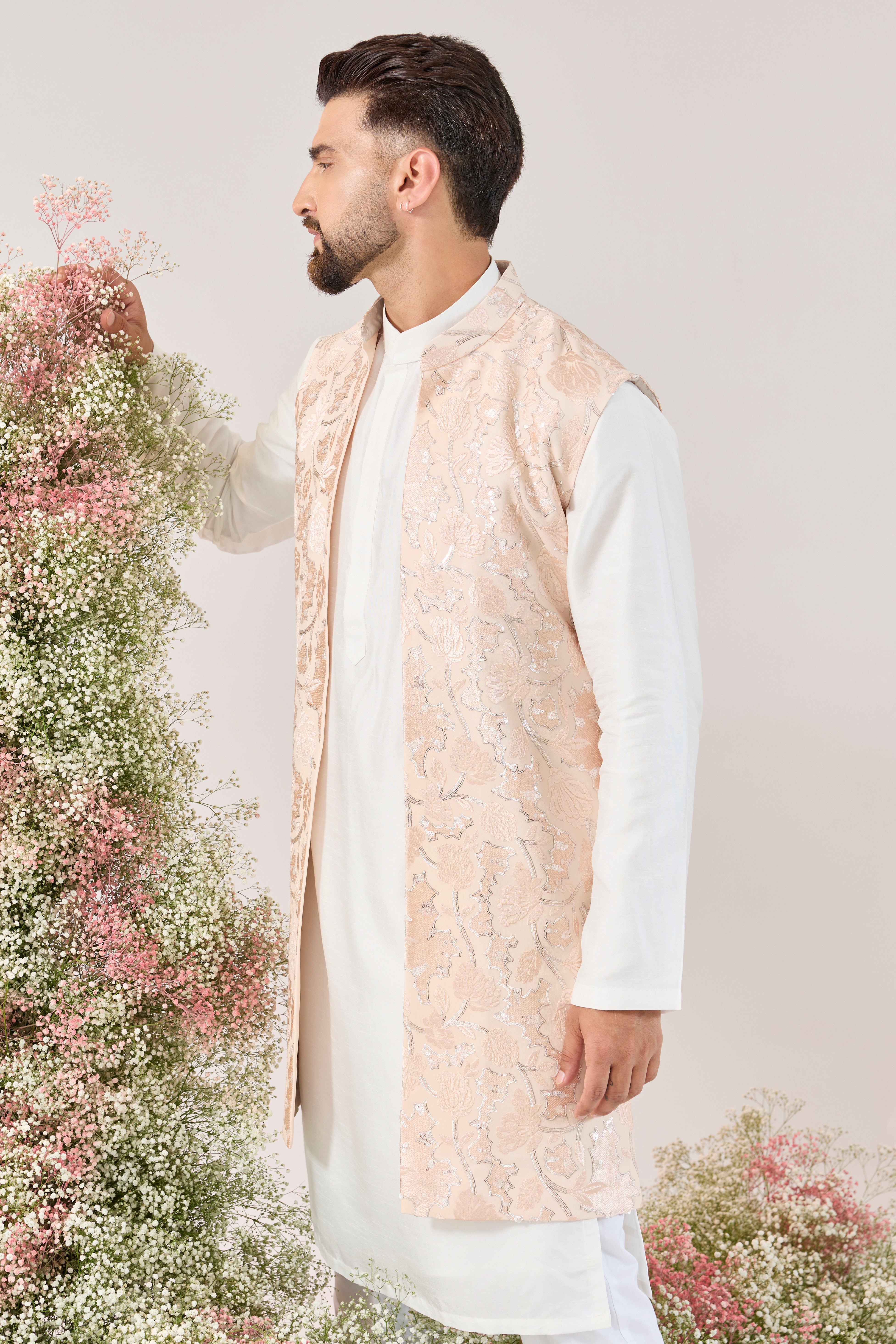baby pink long open jacket with delicate floral pattern and sequin detaiing