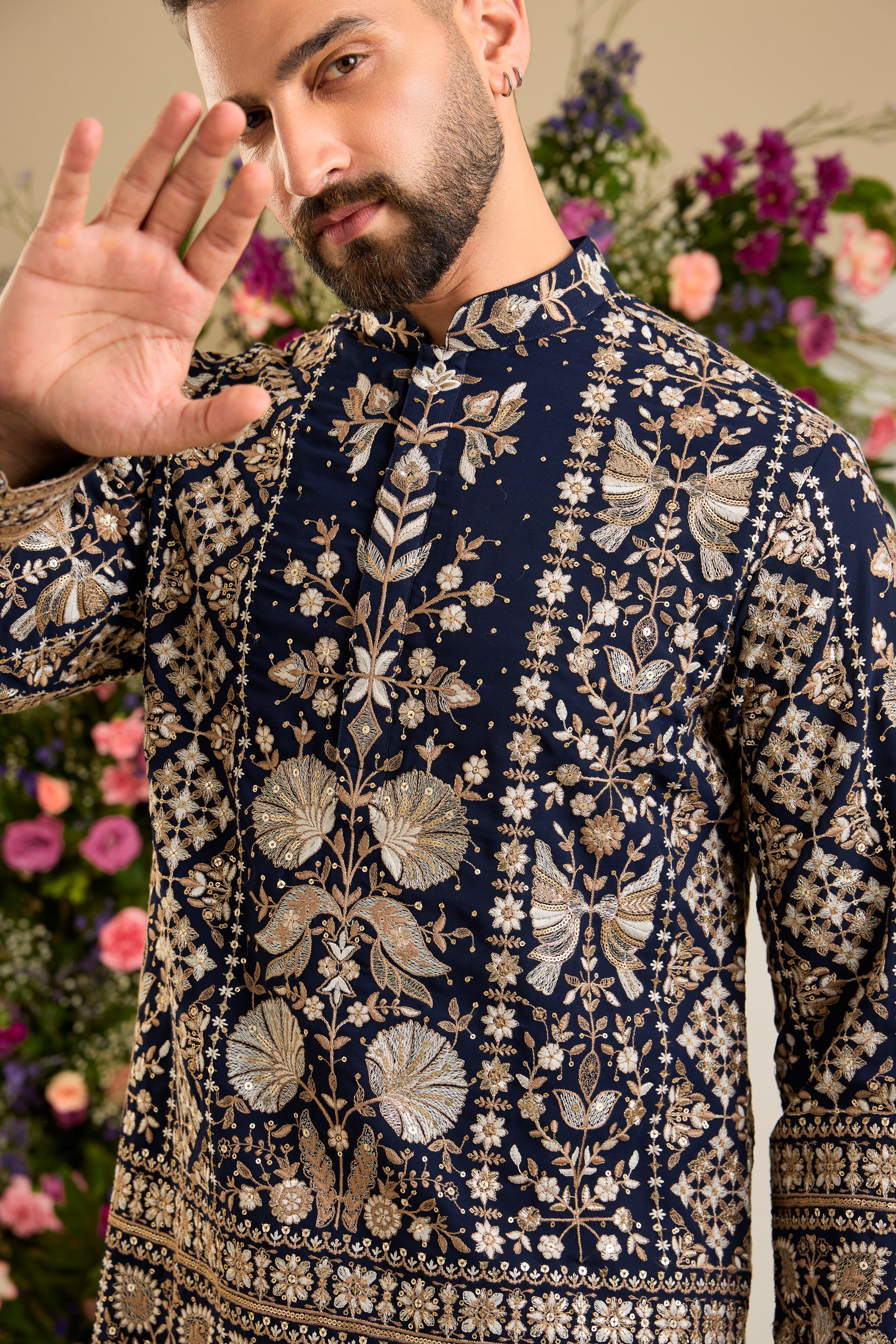 Navy blue floral short kurta with intricate sequin and zari detailing, tailored for timeless elegance and distinguished celebrations.