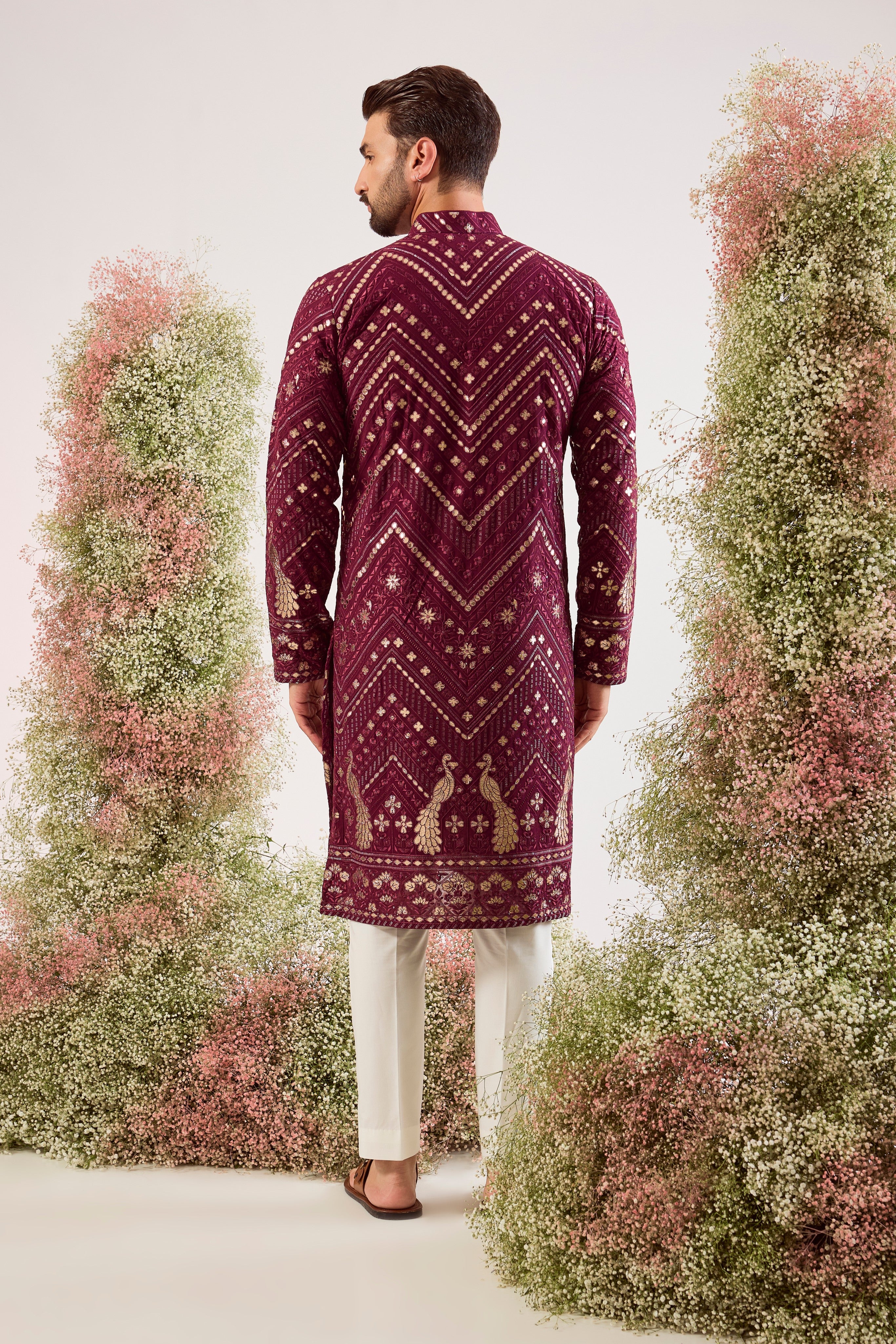 magenta leather patchwork kurta with peacock motifs