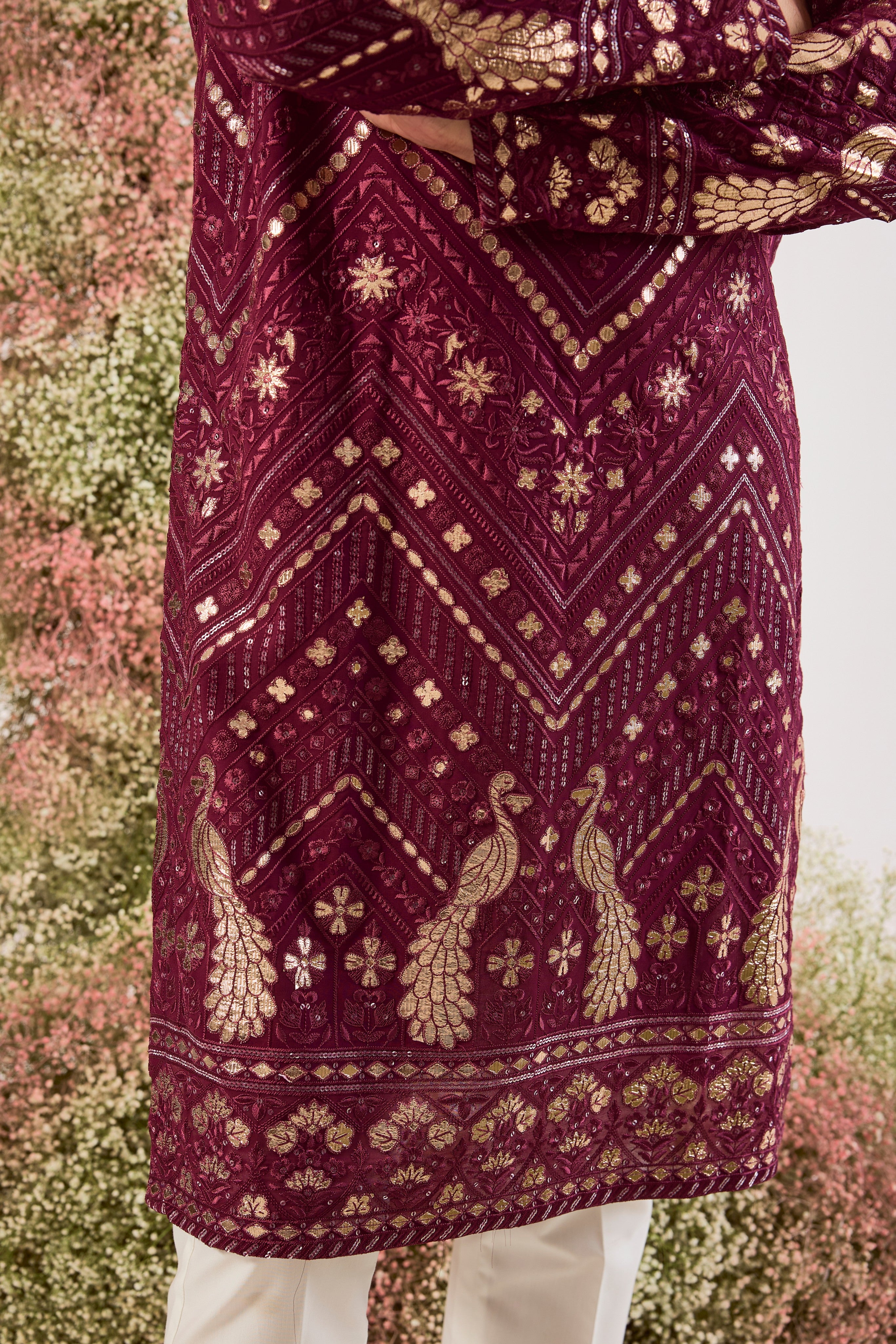 magenta leather patchwork kurta with peacock motifs