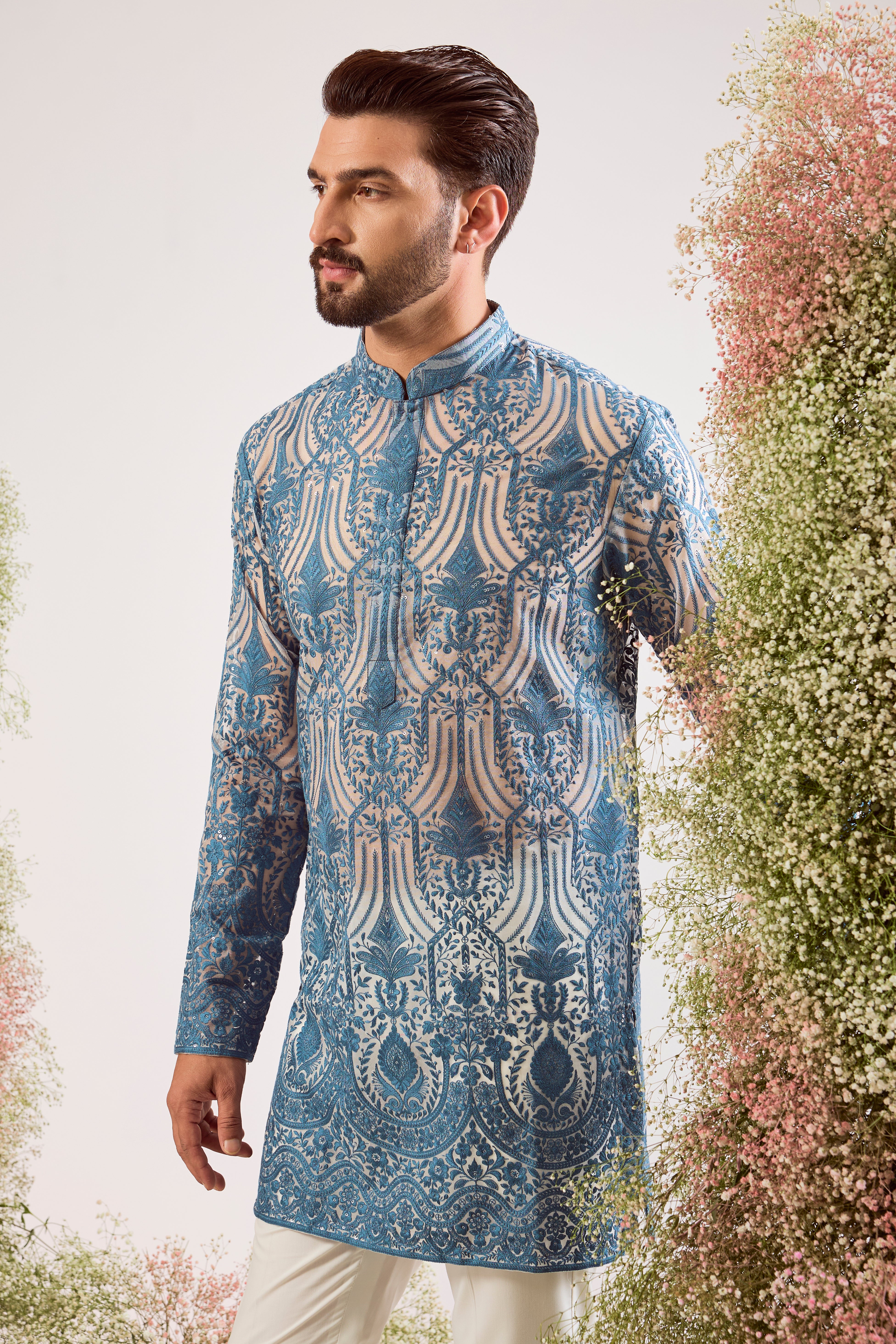radiate elegance in this blue see through short kurta