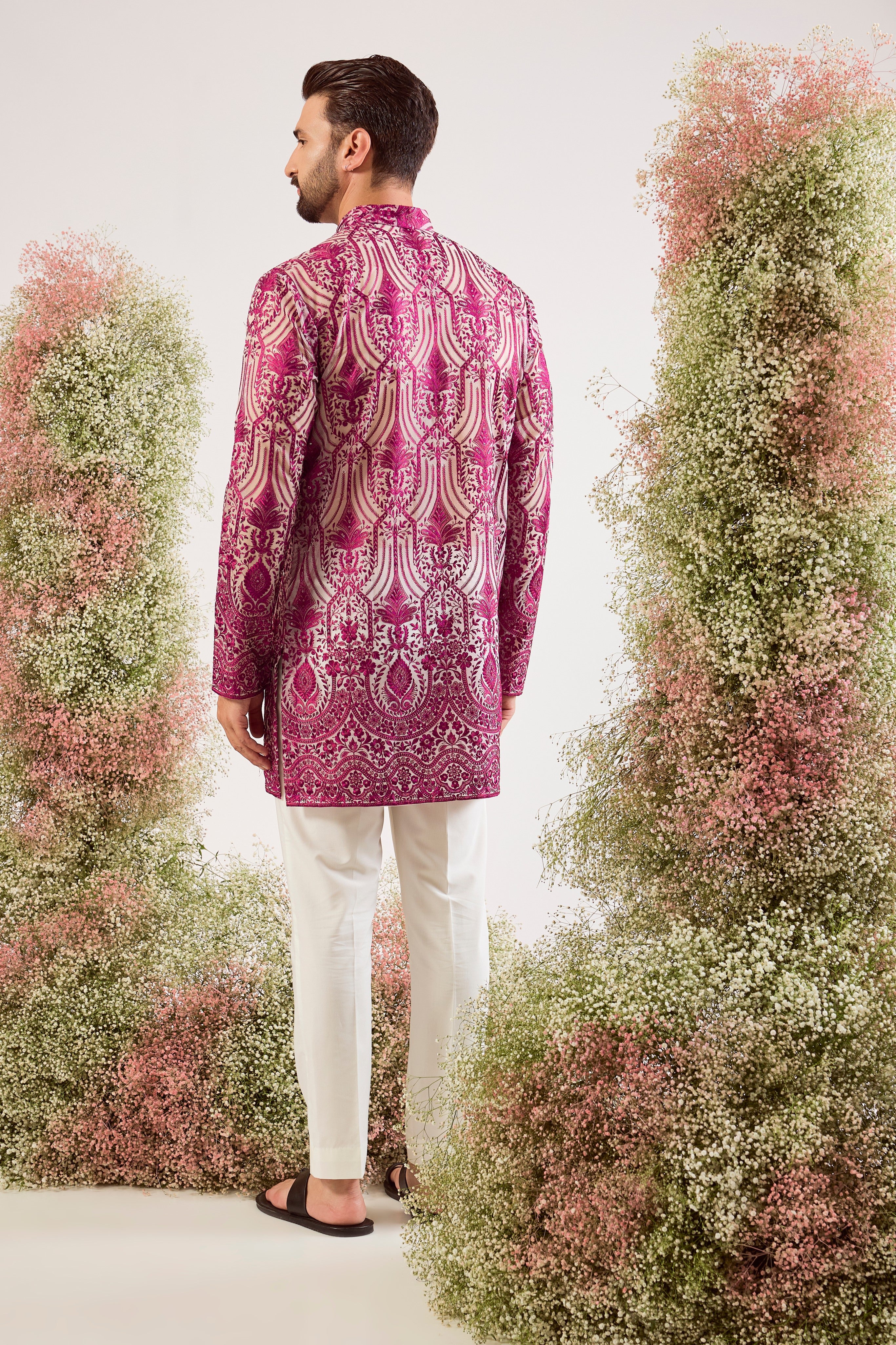 radiate elegance in this magenta see through short kurta