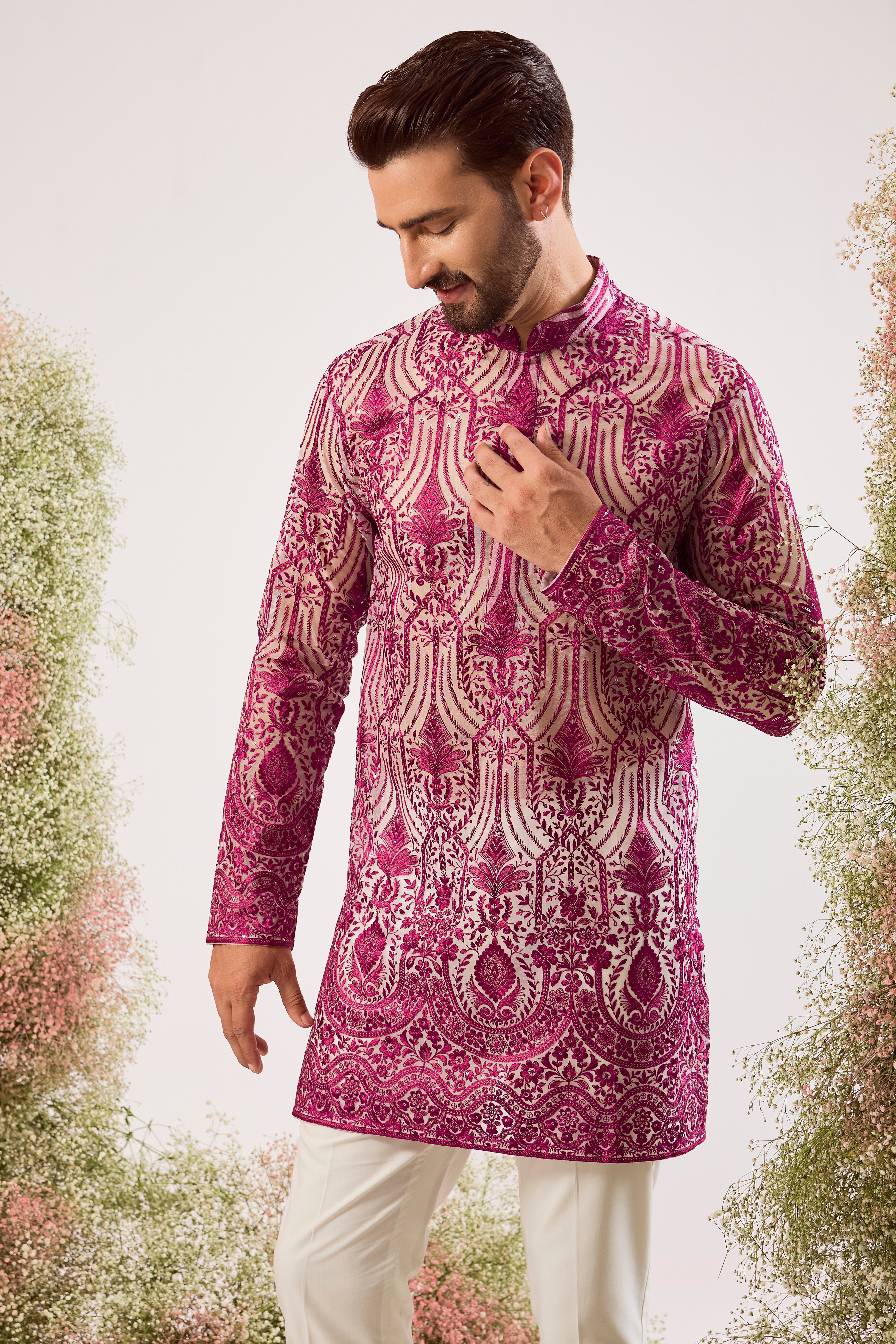 radiate elegance in this magenta see through short kurta