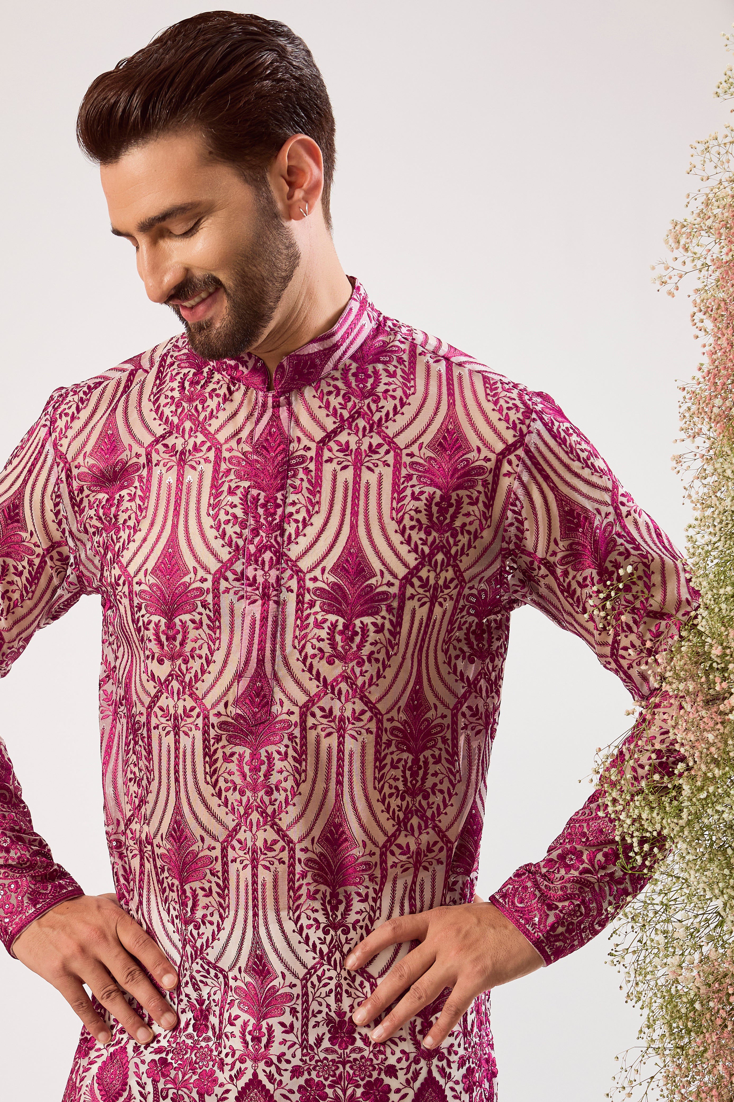 radiate elegance in this magenta see through short kurta