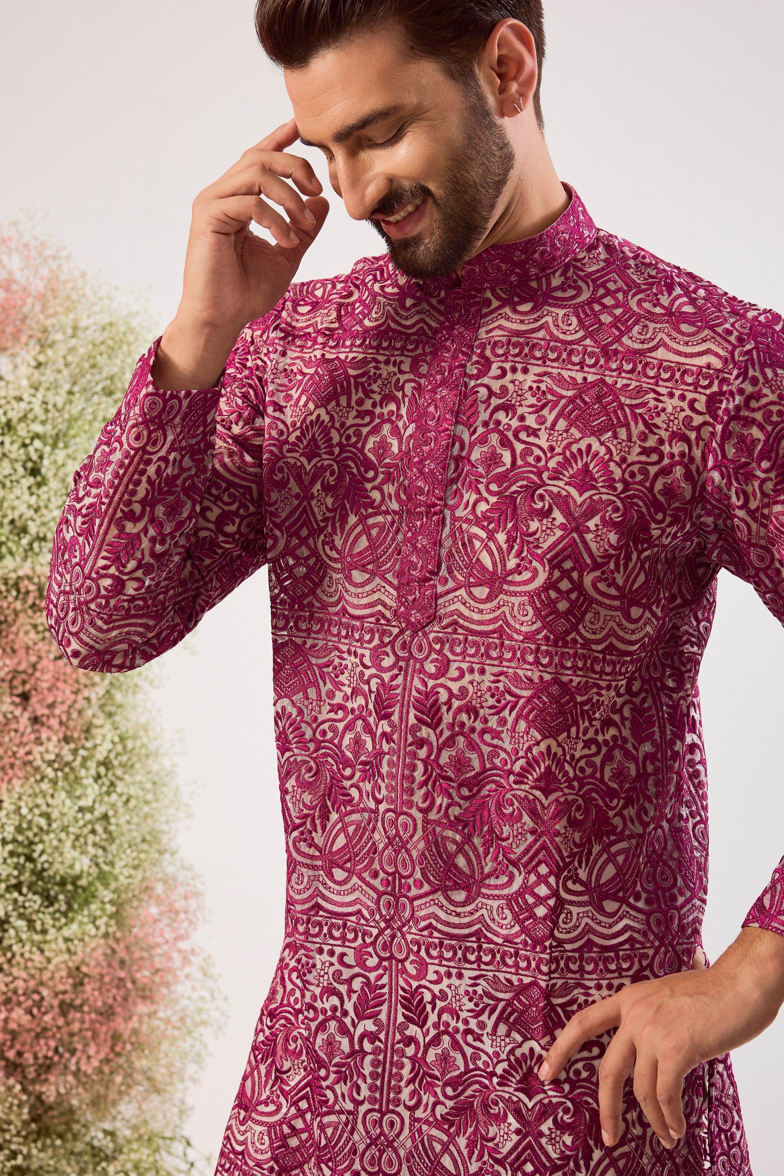 radiate elegance in this magenta open front see through short kurta