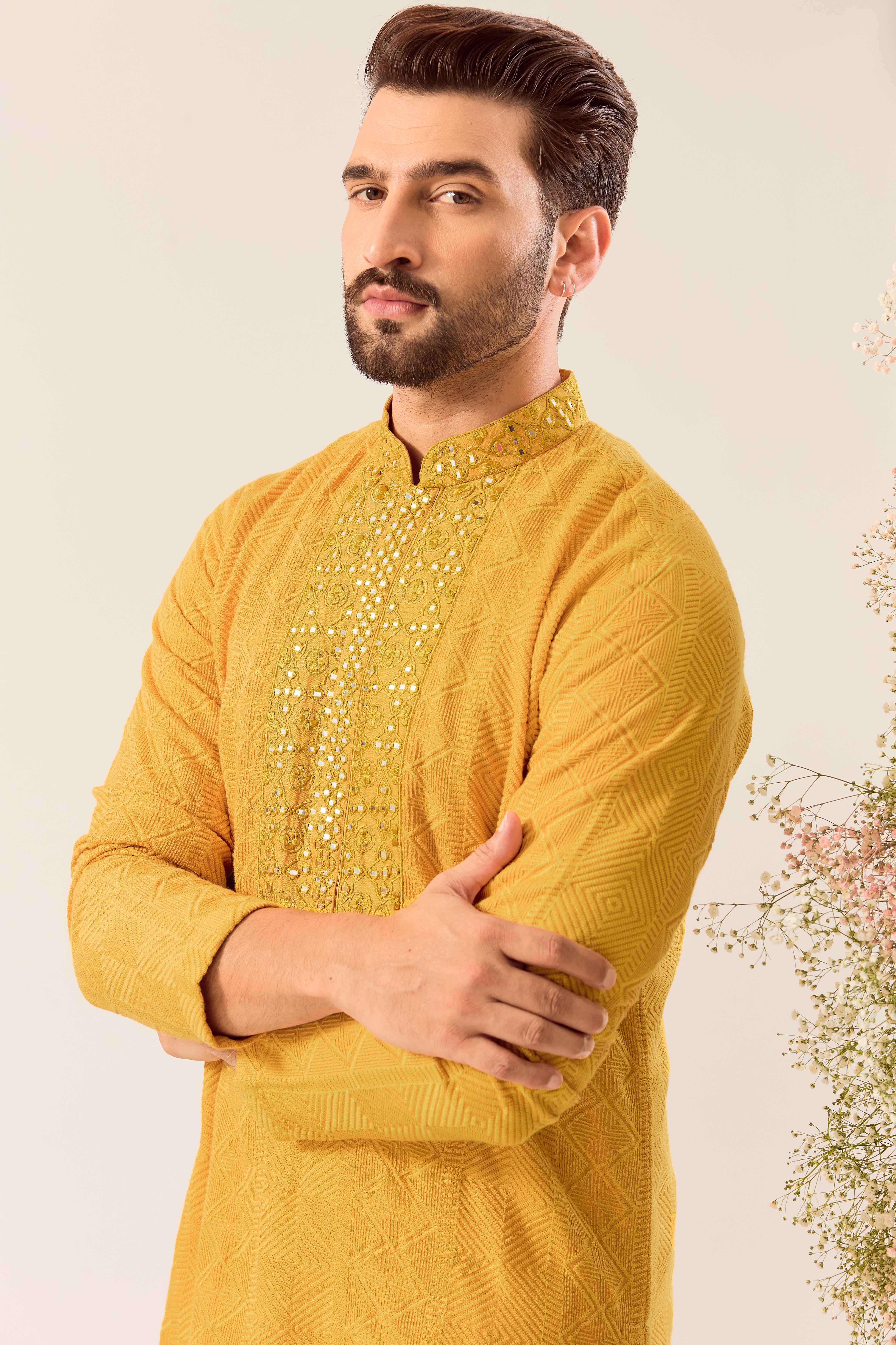 mustard chikankari kurta with intricately hand done mirror work neckline