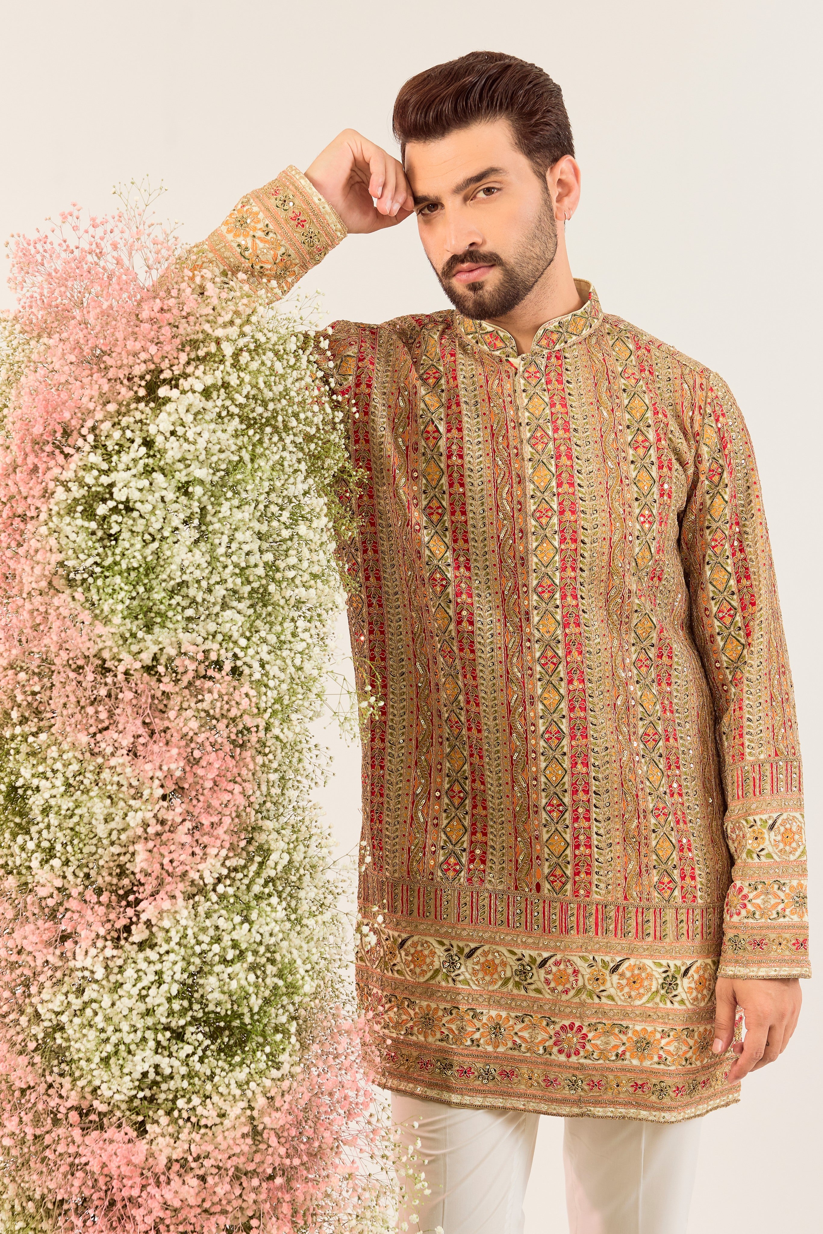 ivory/multi coloured short kurta with intricate zari work