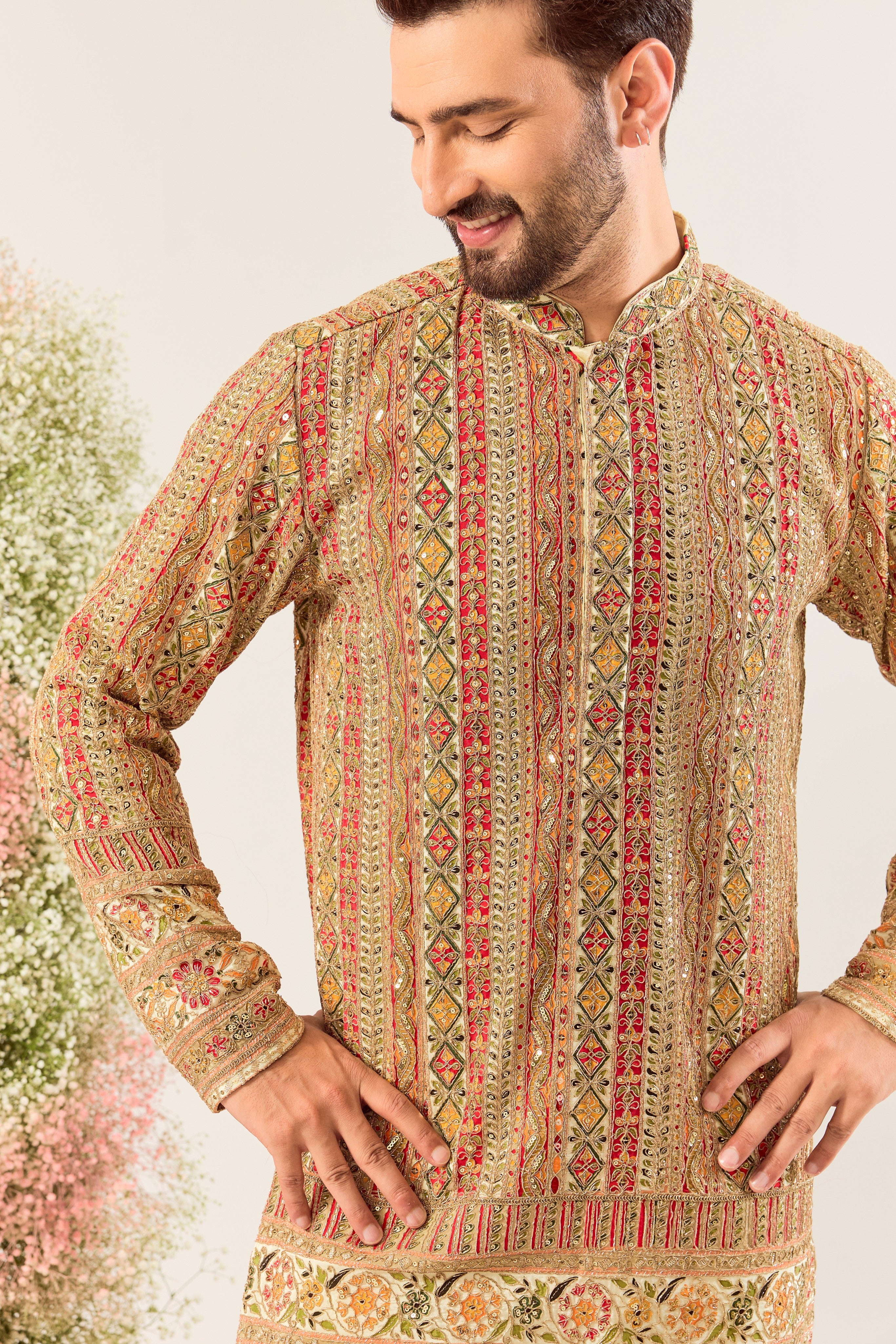 ivory/multi coloured short kurta with intricate zari work