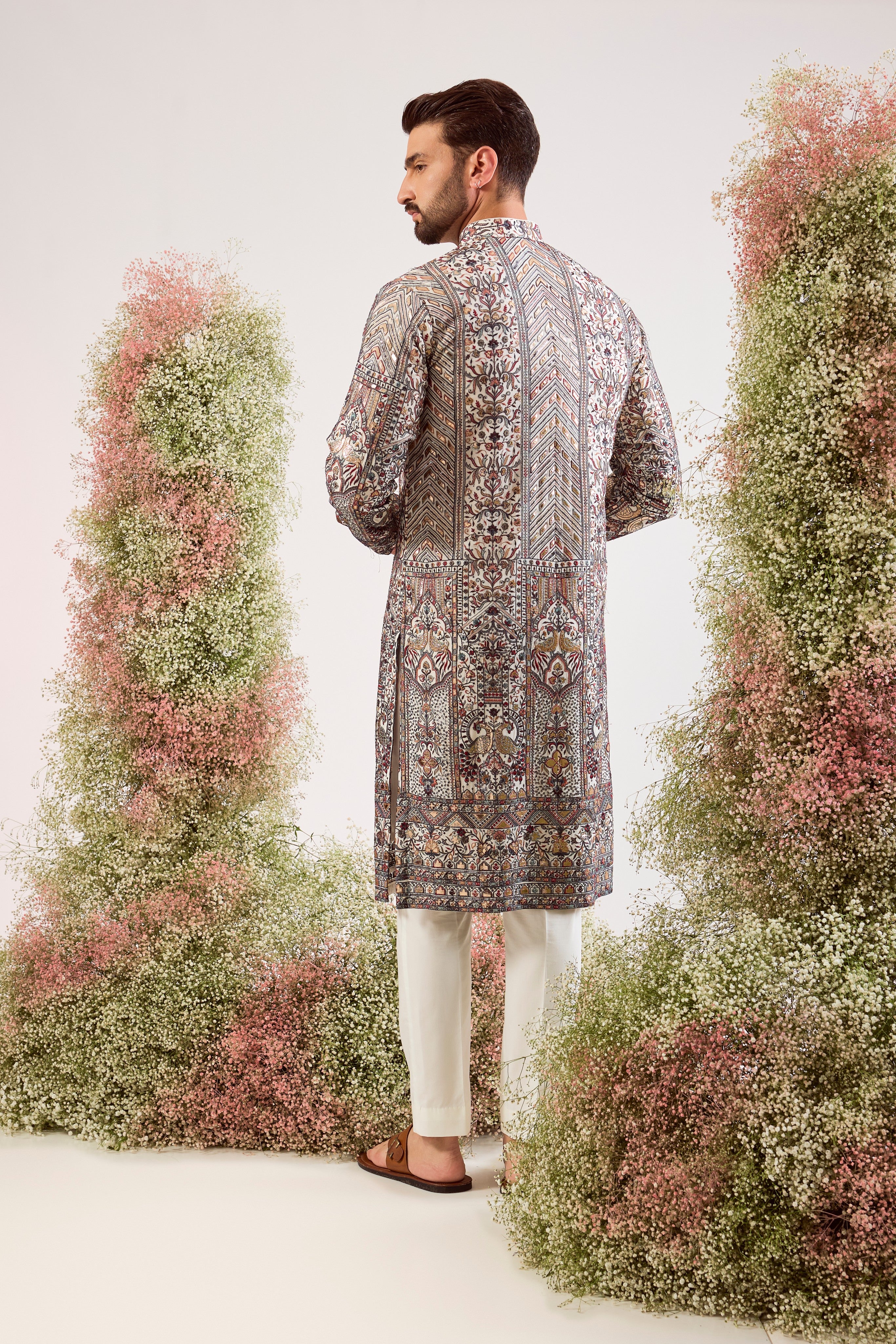 white leather patchwork kurta with intricate flora and fauna embroidery