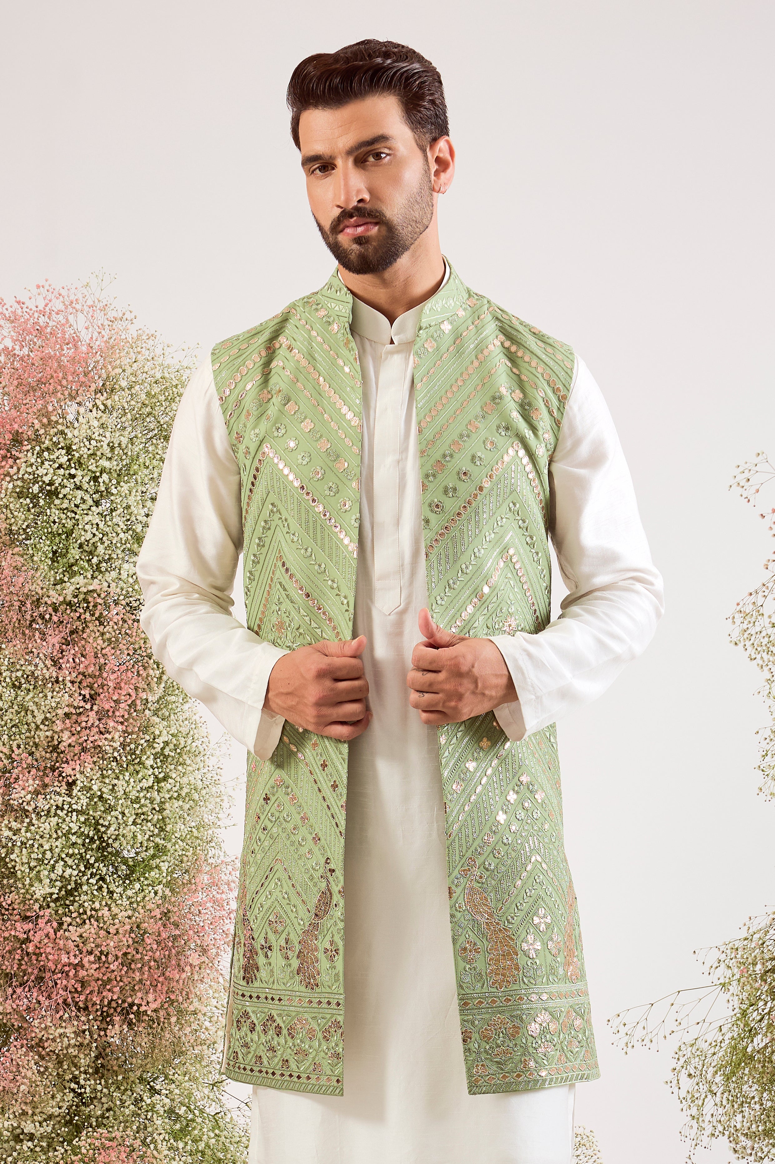 sage green leather patchwork long open jacket with peacock motifs