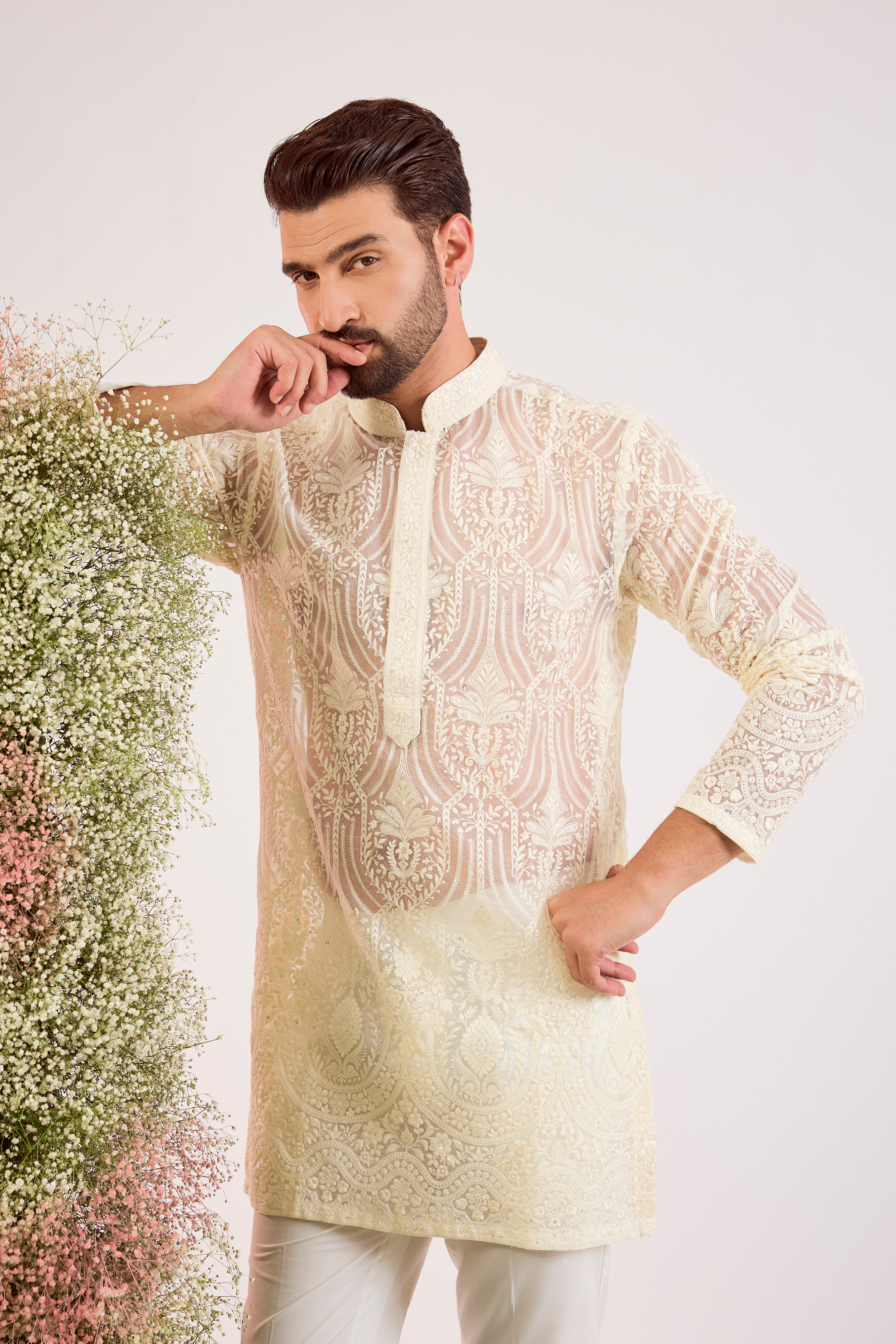 white short see through chickankari kurta with intricate sequin embroidery