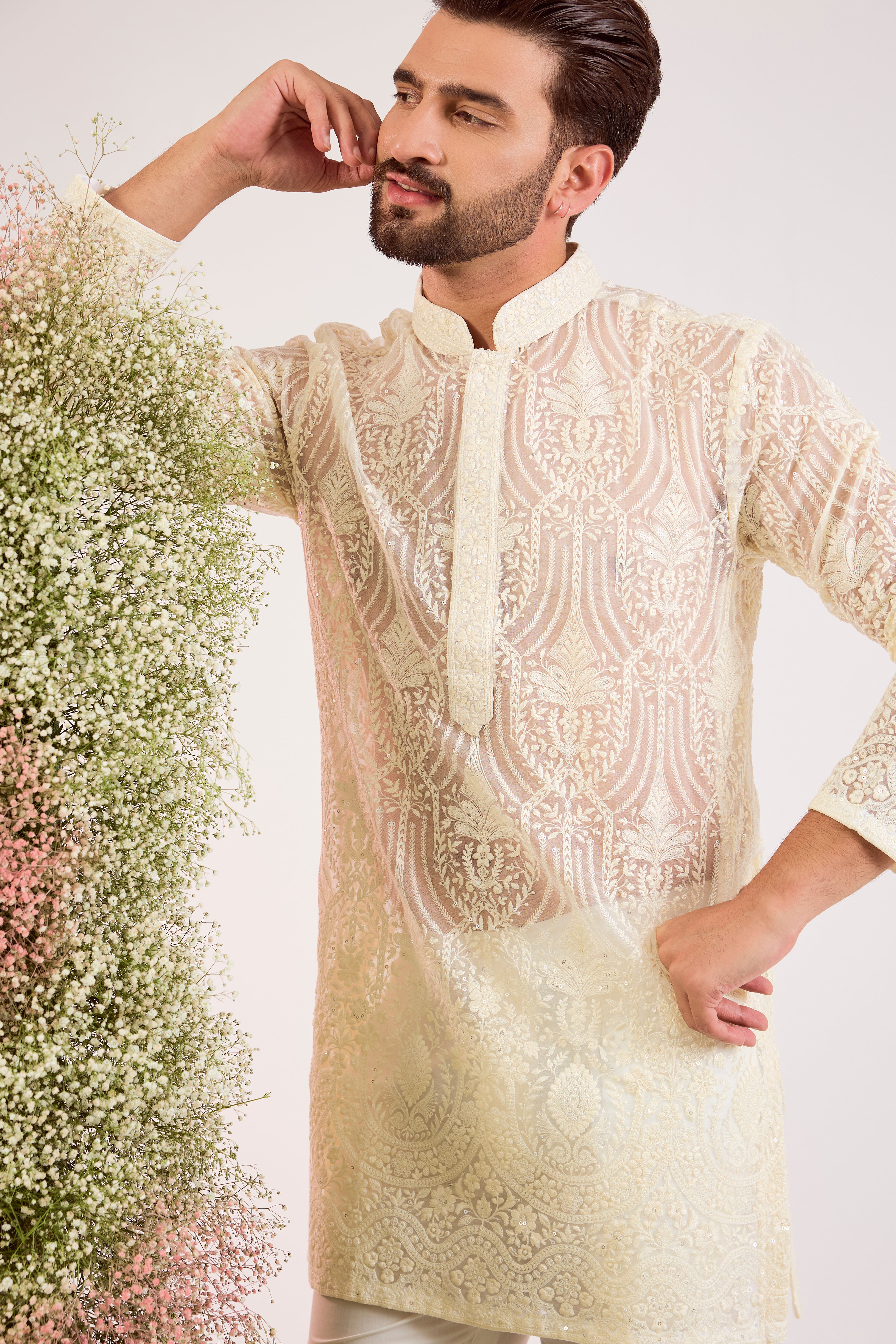 white short see through chickankari kurta with intricate sequin embroidery