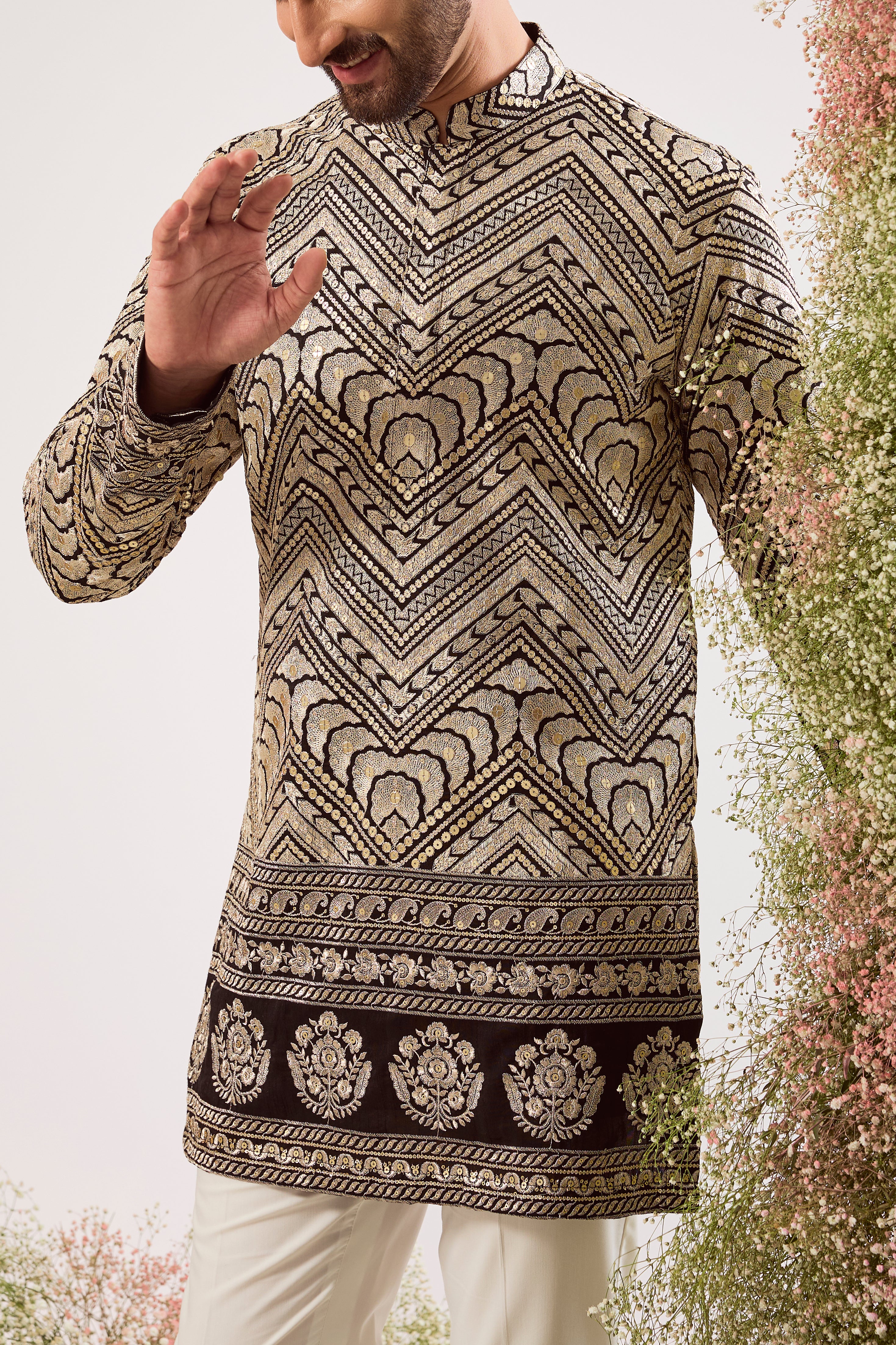 black short zari kurta with golden thread work and sequin details