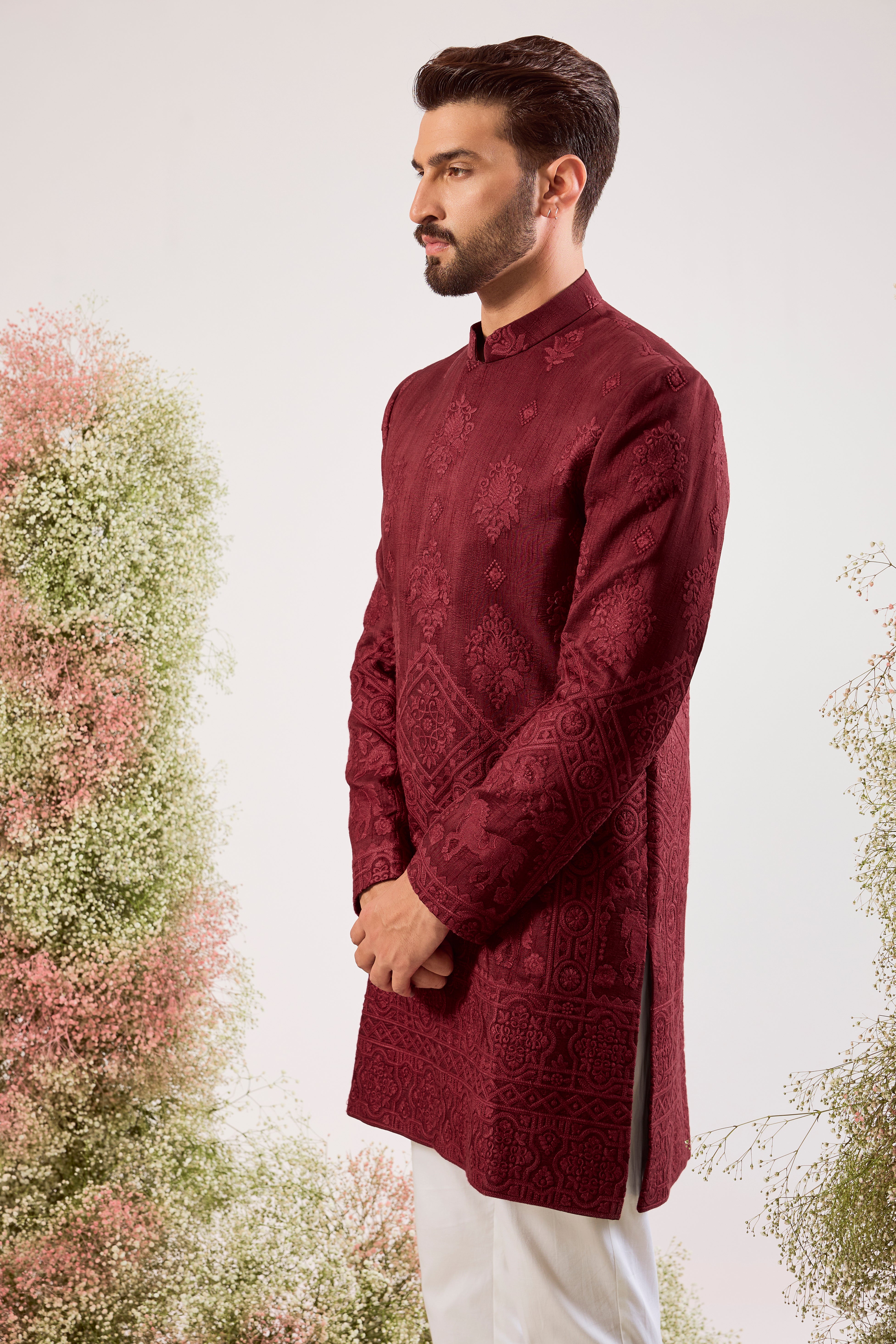 maroon short chikankari sherwani with intricate horse figures and tone to tone threadwork