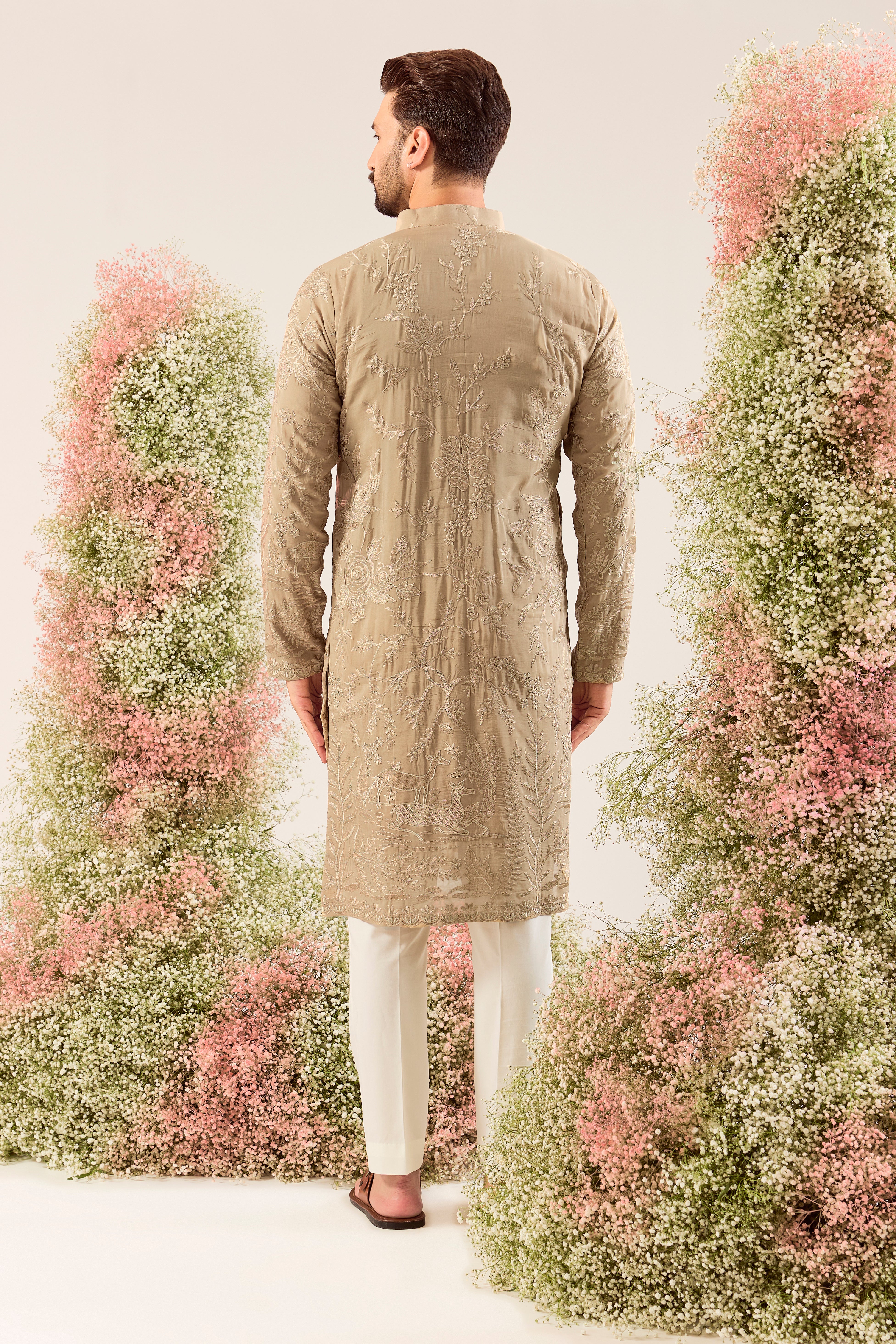 brown threadwork kurta with intricate flora and fauna embroidery