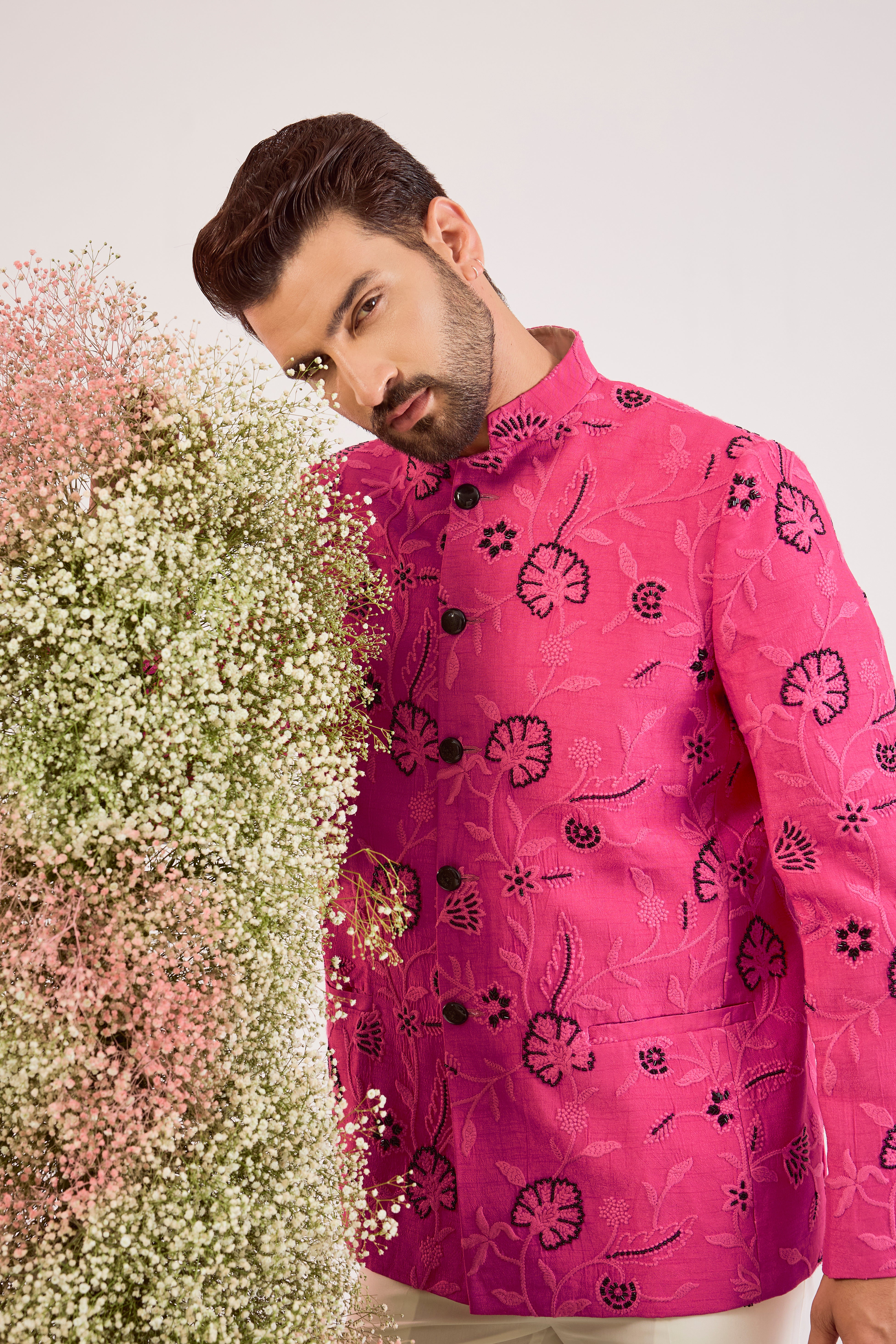 hot pink bandgala with sleek black cut dana and floral embroidery