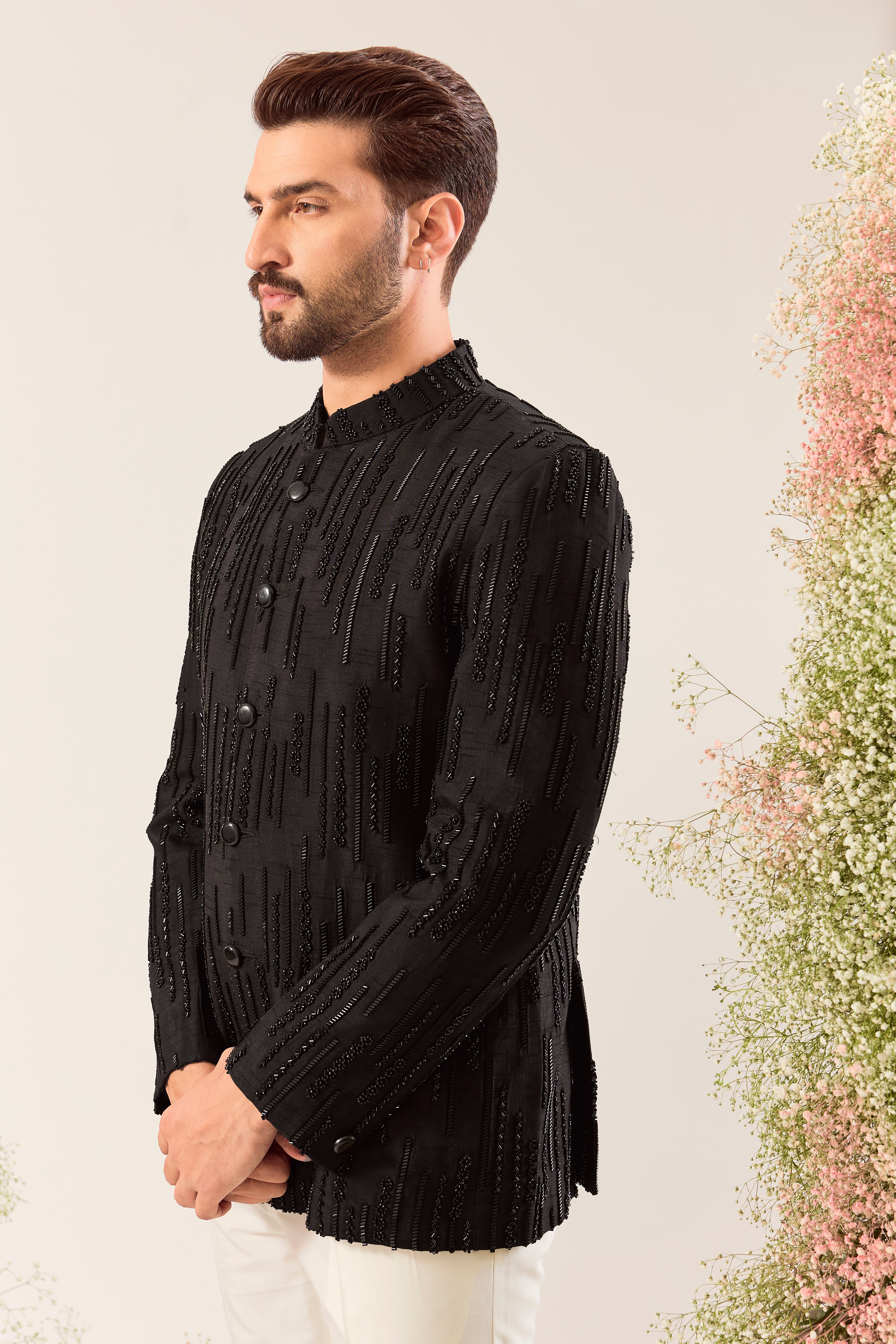 black signature bandgala with intricate cut dana work