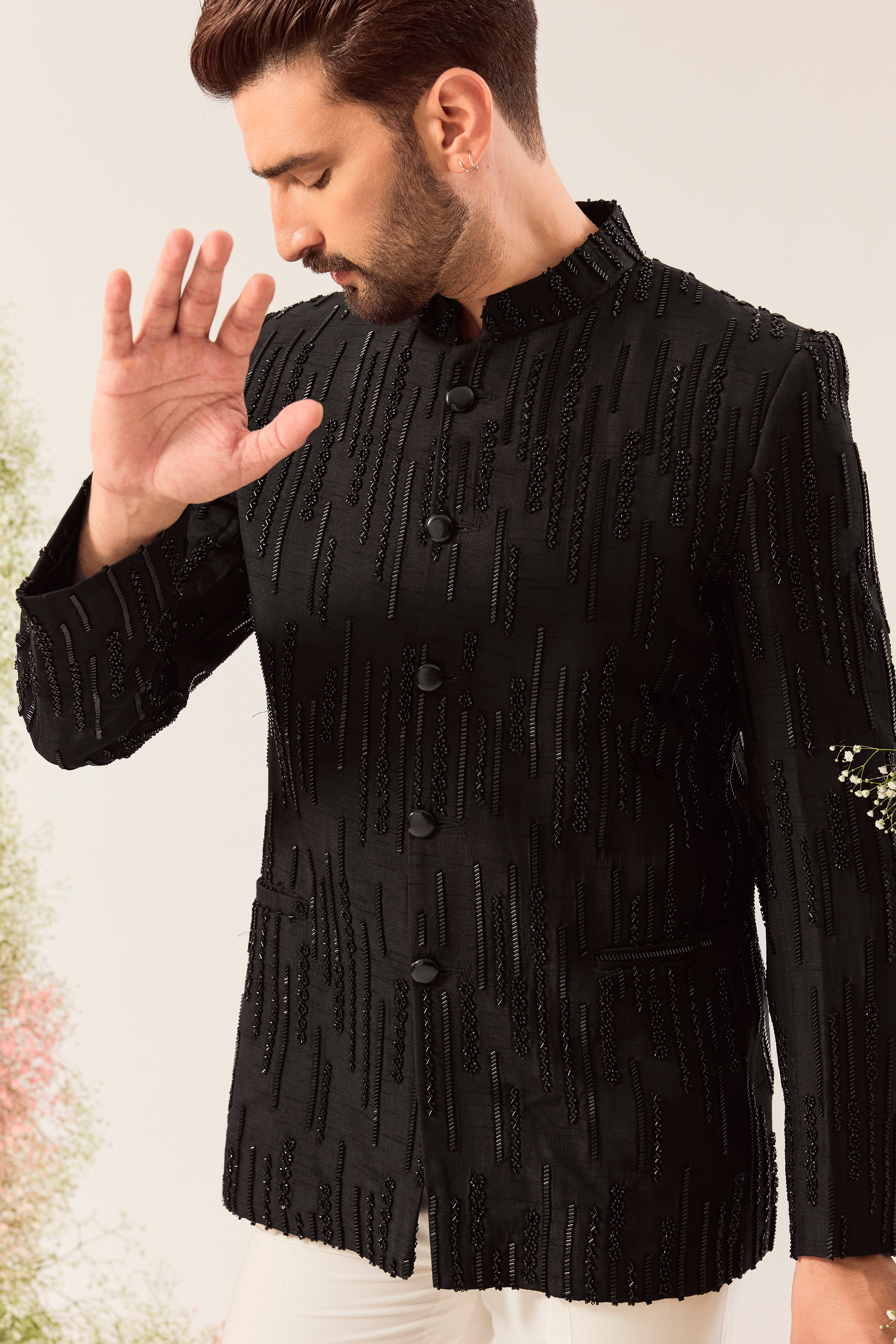 black signature bandgala with intricate cut dana work