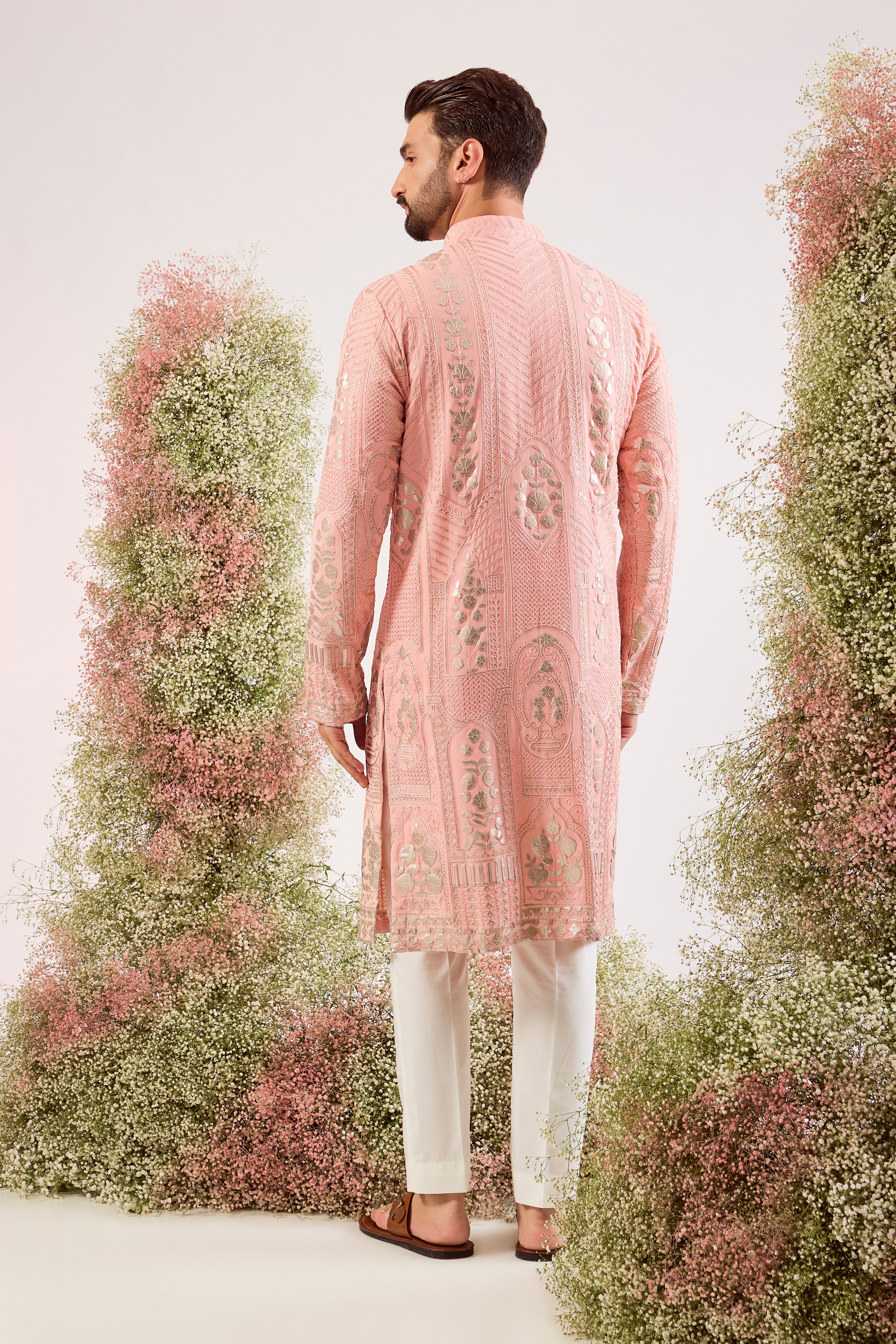 peach leather patchwork kurta with intricate thread and sequin work