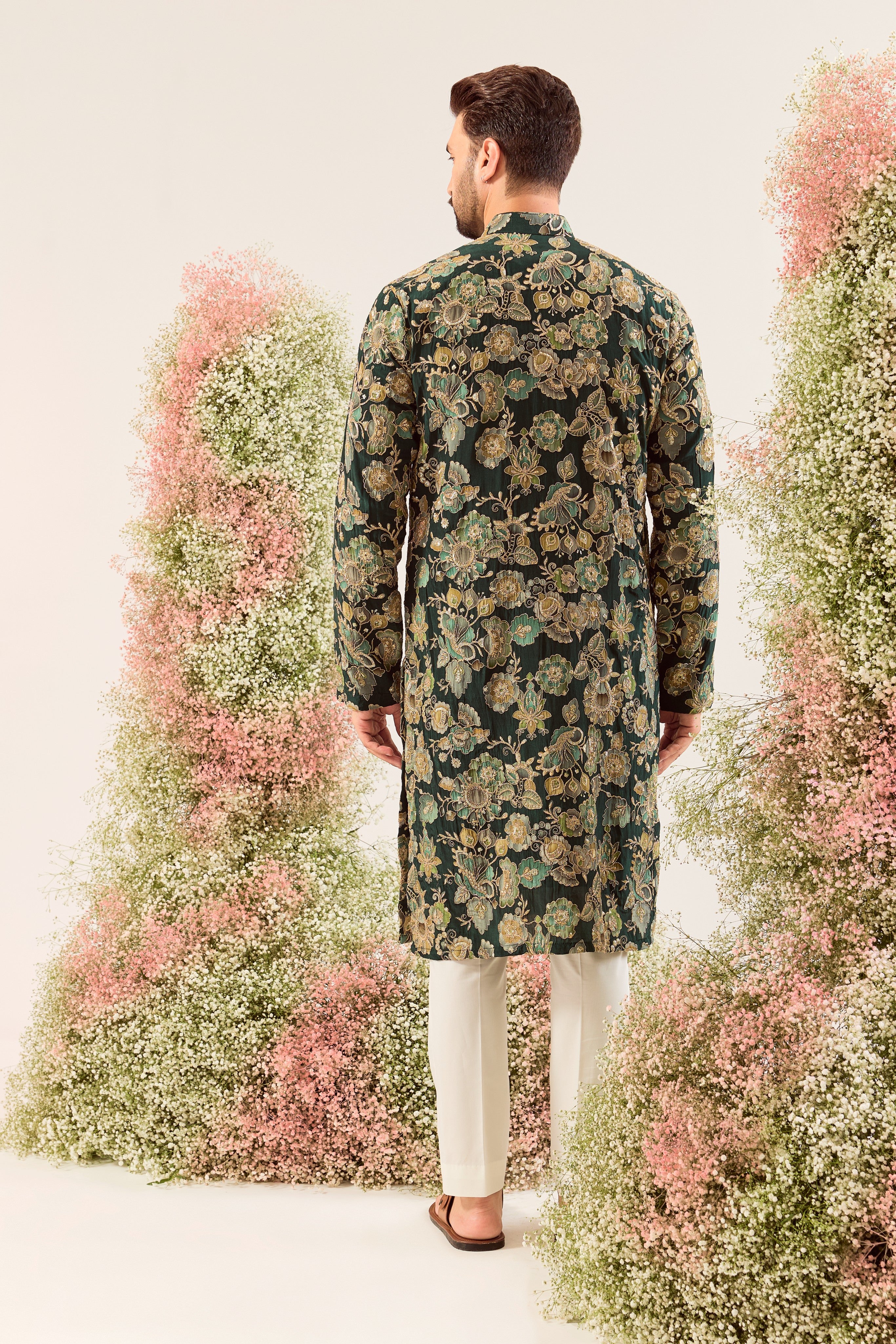 green long kurta with intricate floral embroidery done with deatiled zari & sequin