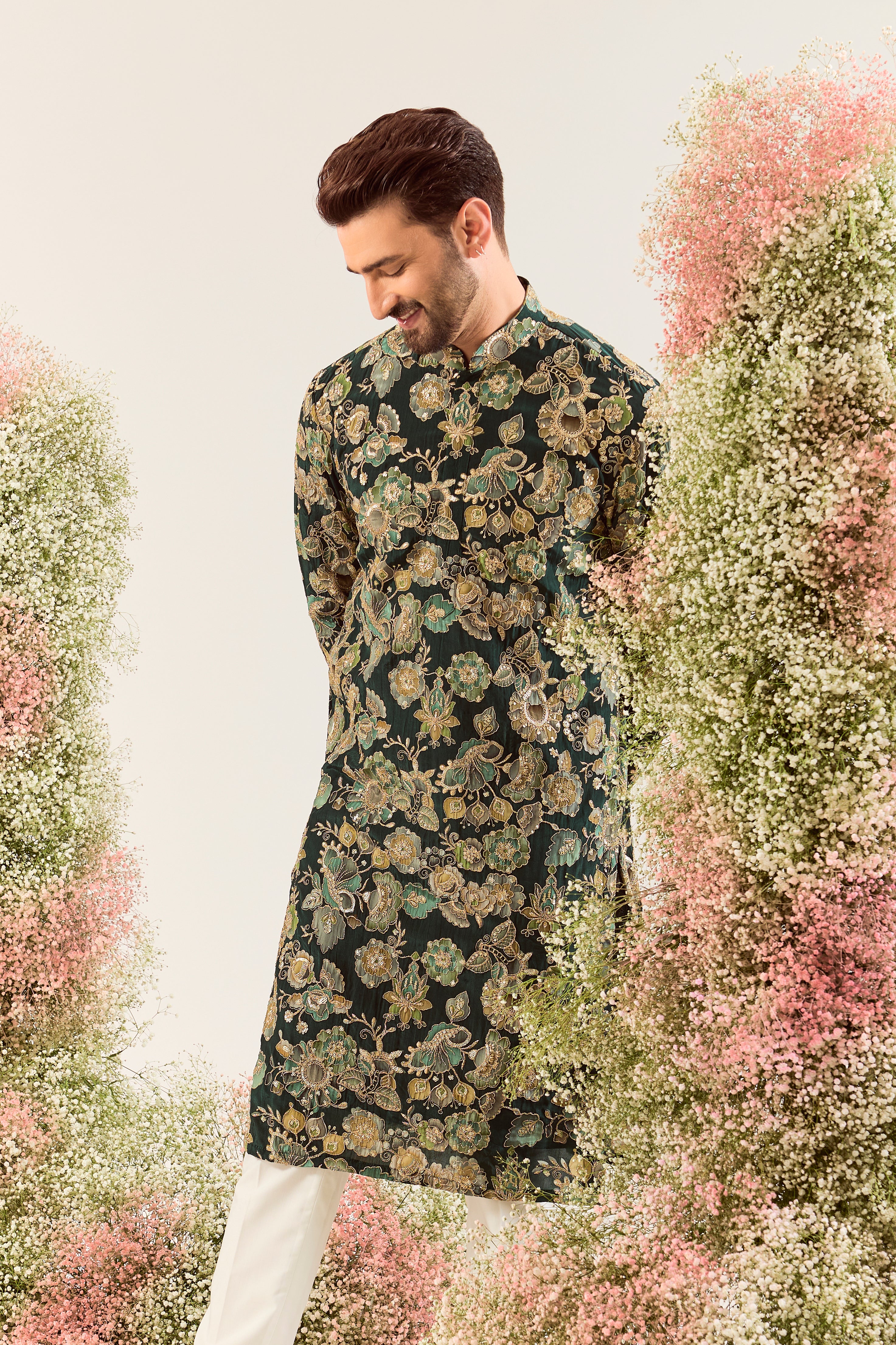 green long kurta with intricate floral embroidery done with deatiled zari & sequin