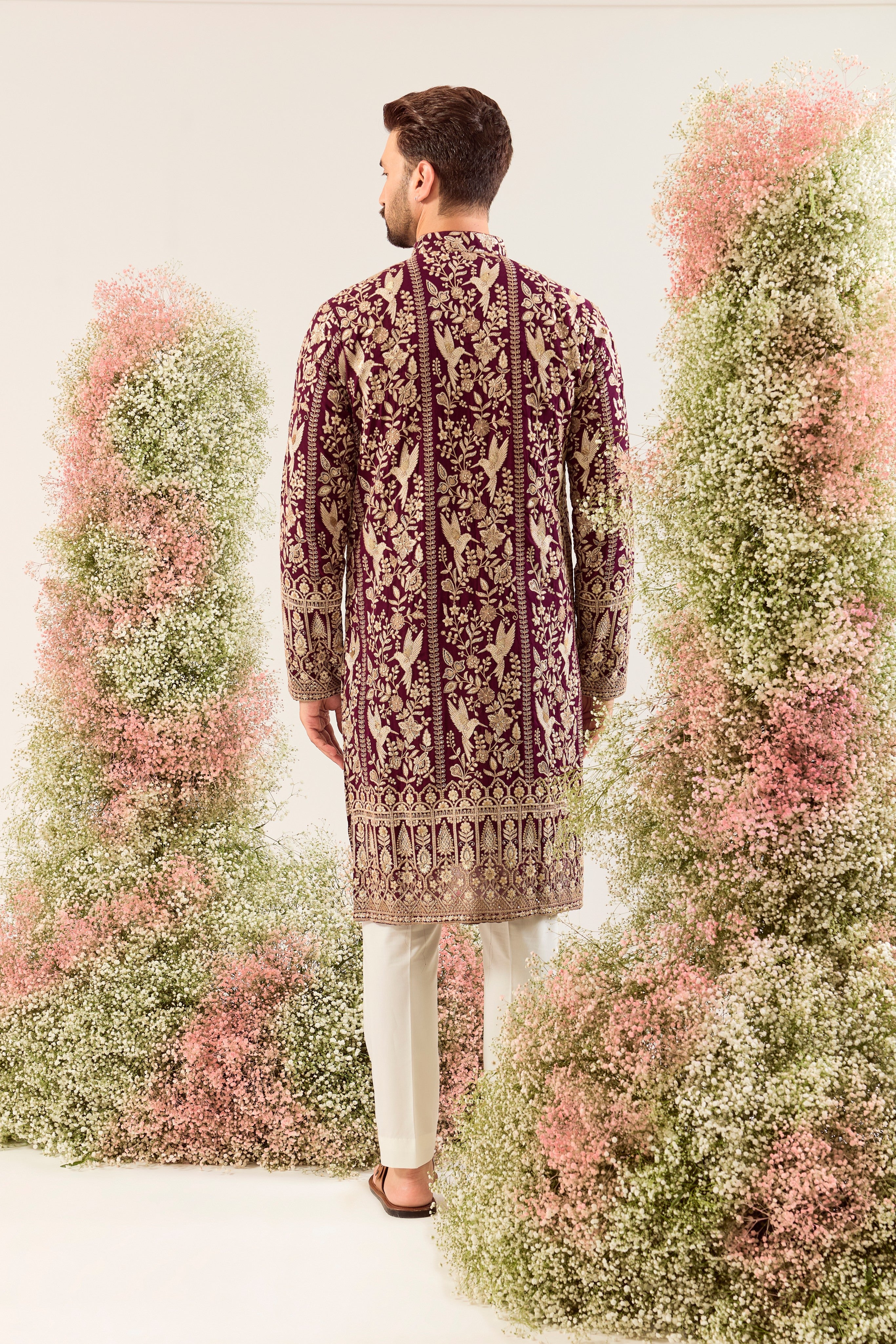 wine chikankari kurta with intriacte flora and fauna decorated with sequin