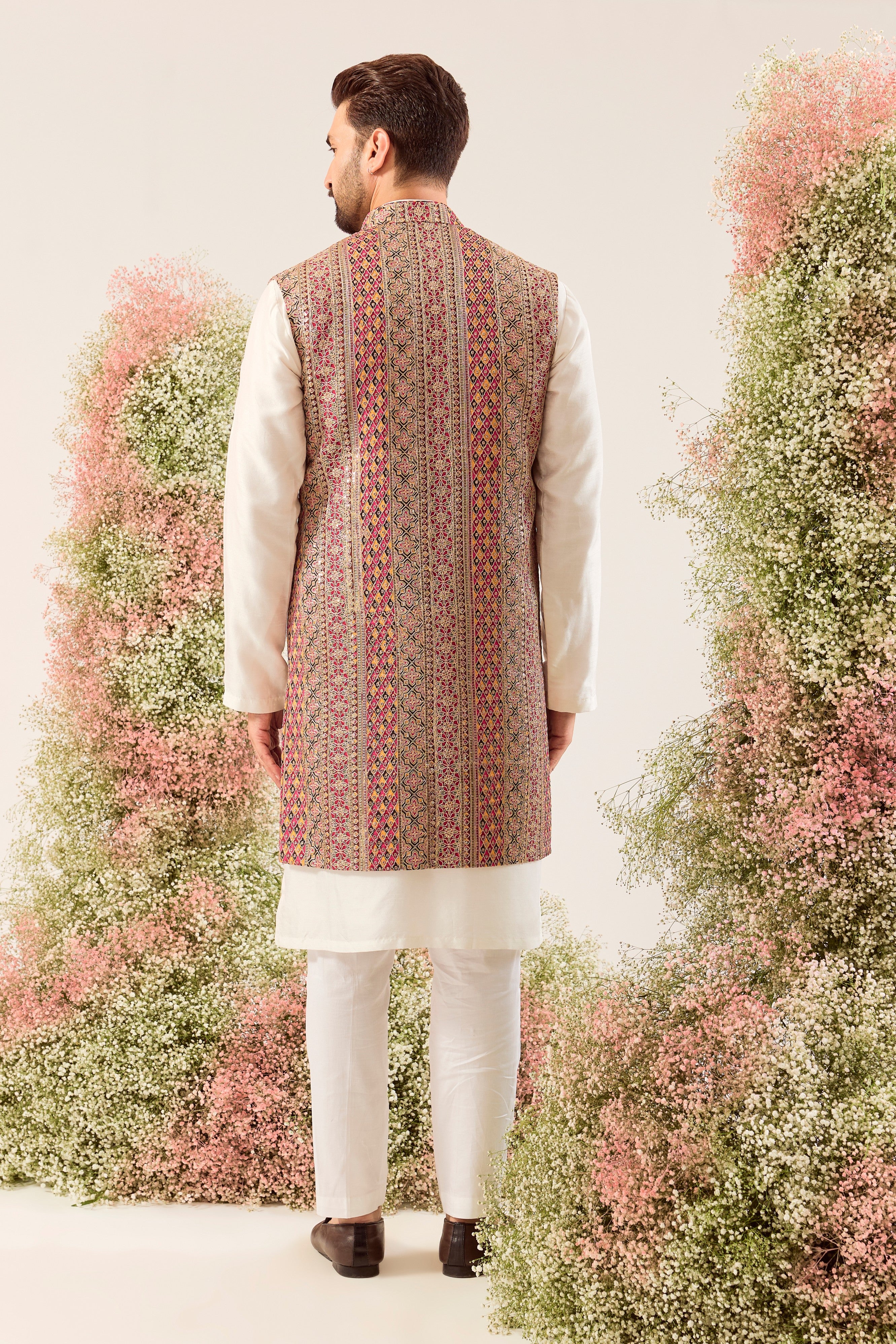 multi coloured long open jacket with heavy zari and sequin work