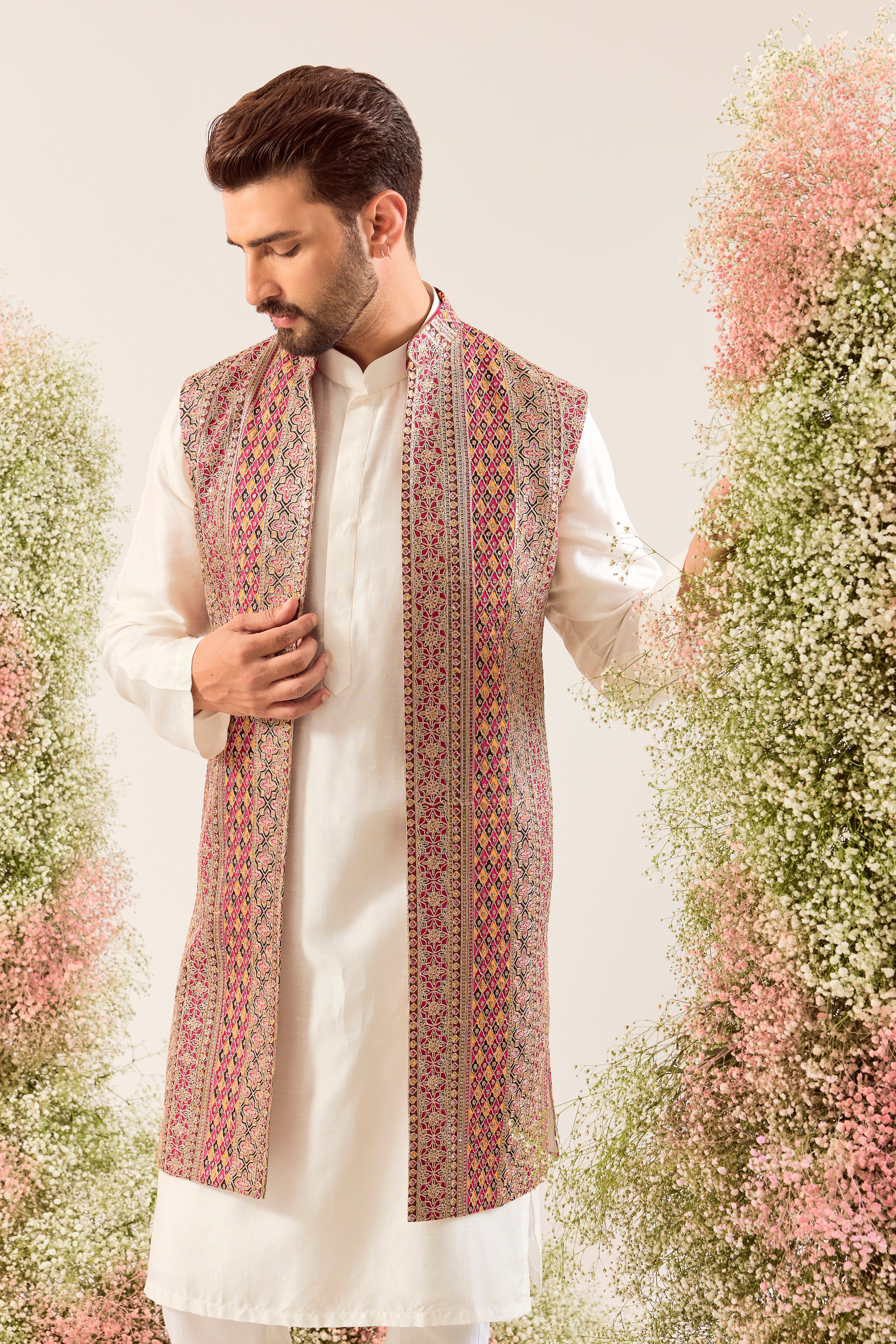 multi coloured long open jacket with heavy zari and sequin work