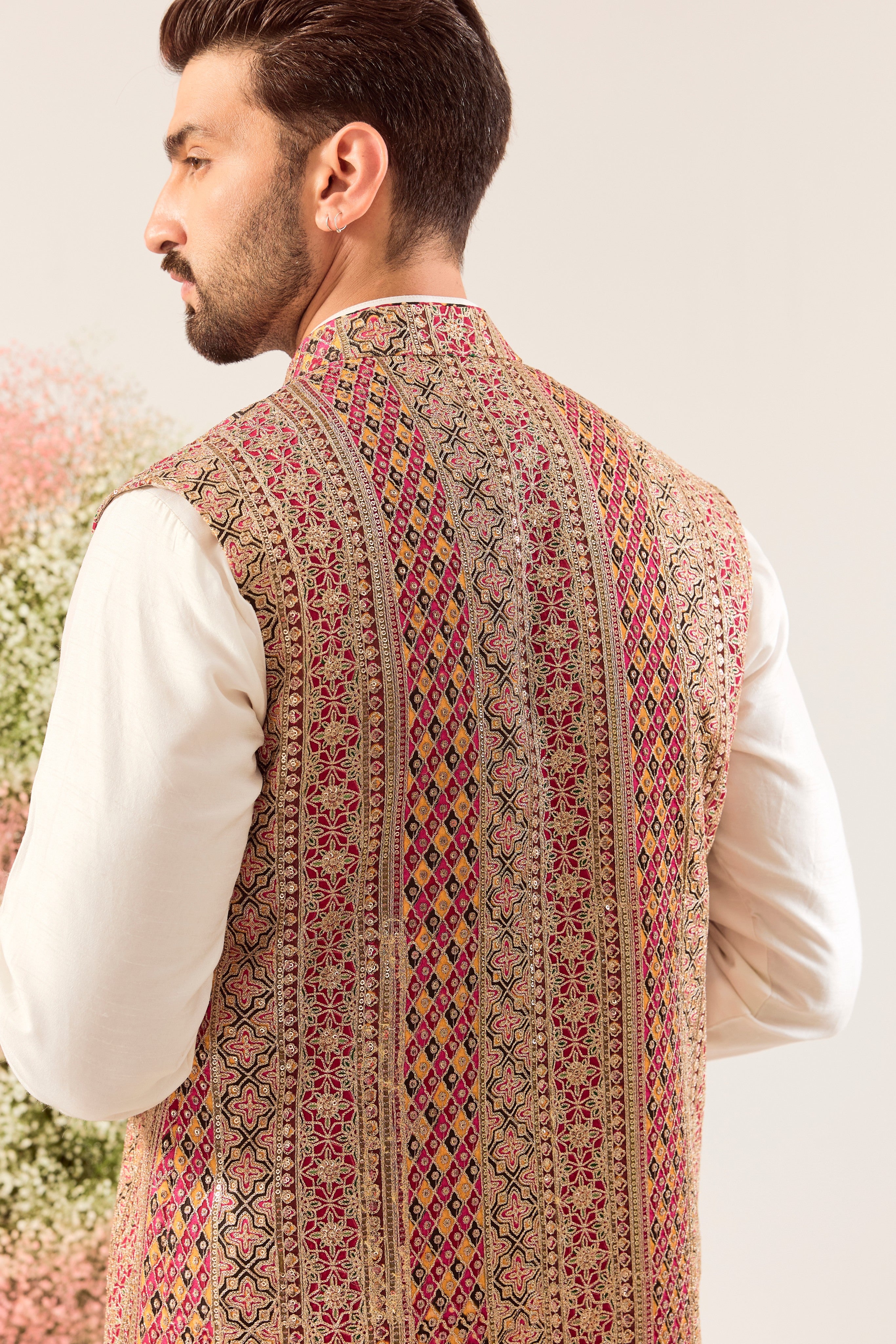 multi coloured long open jacket with heavy zari and sequin work