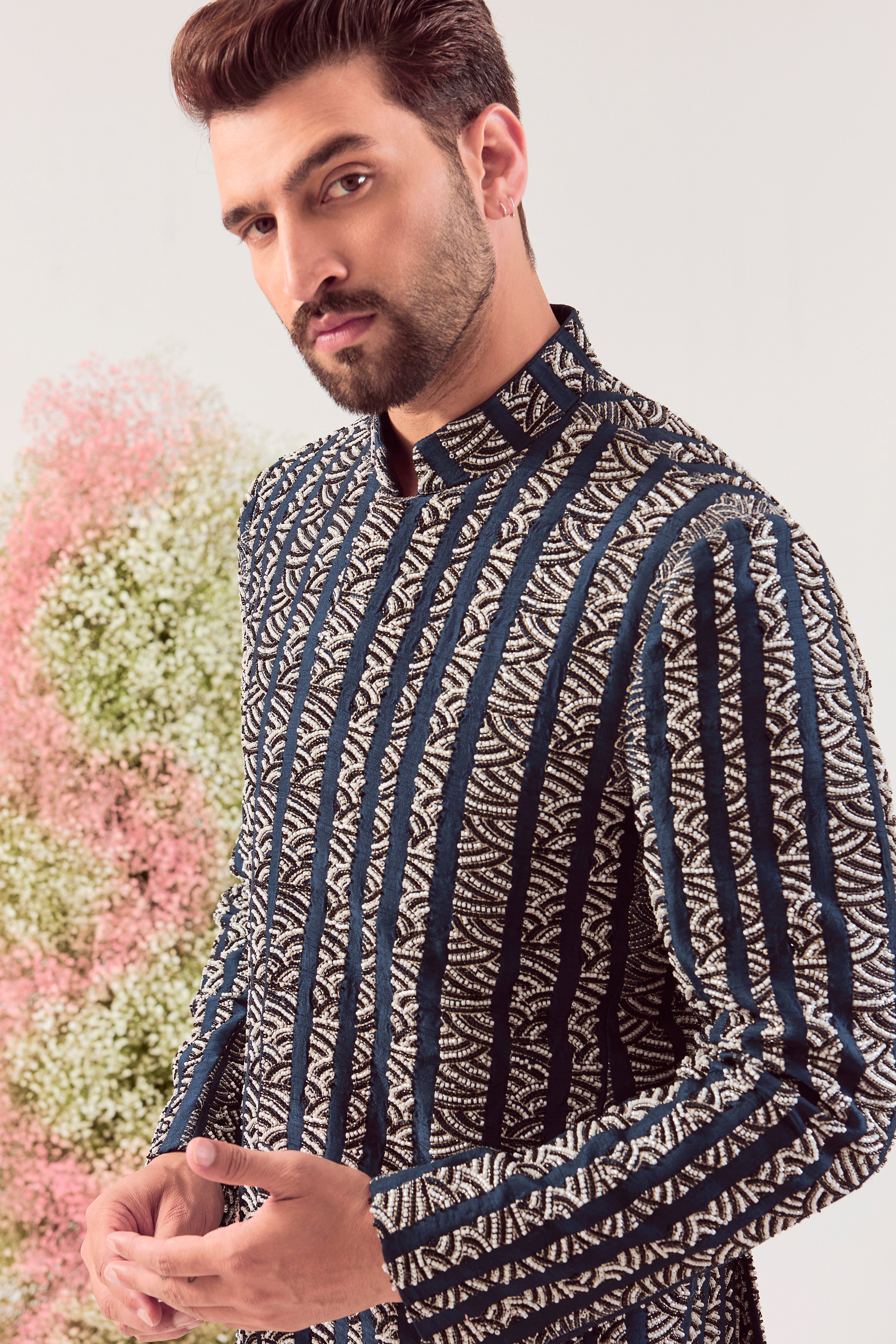 Our signature navy blue bandgala with intricate black and white bead work