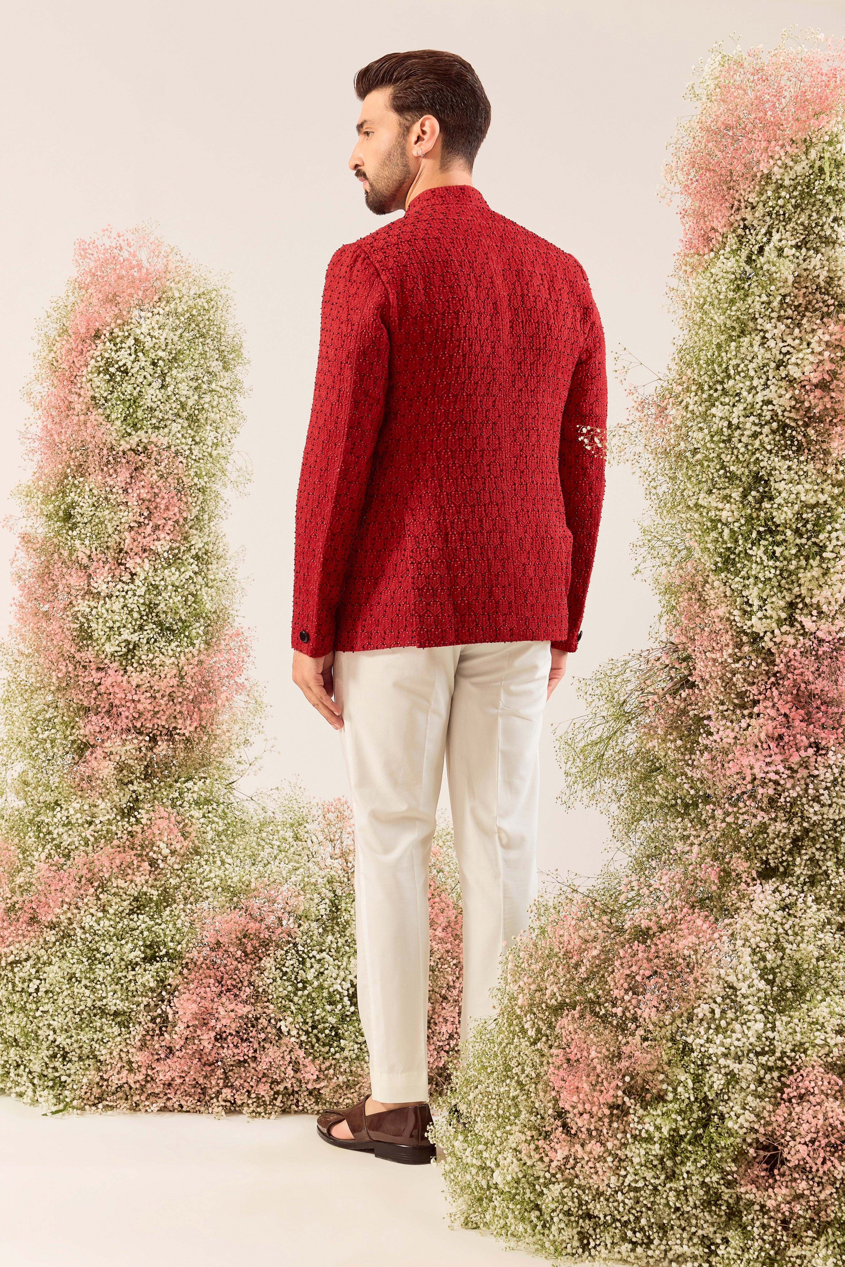 our classic red bandgala with intricate thread work and sleek cut dana