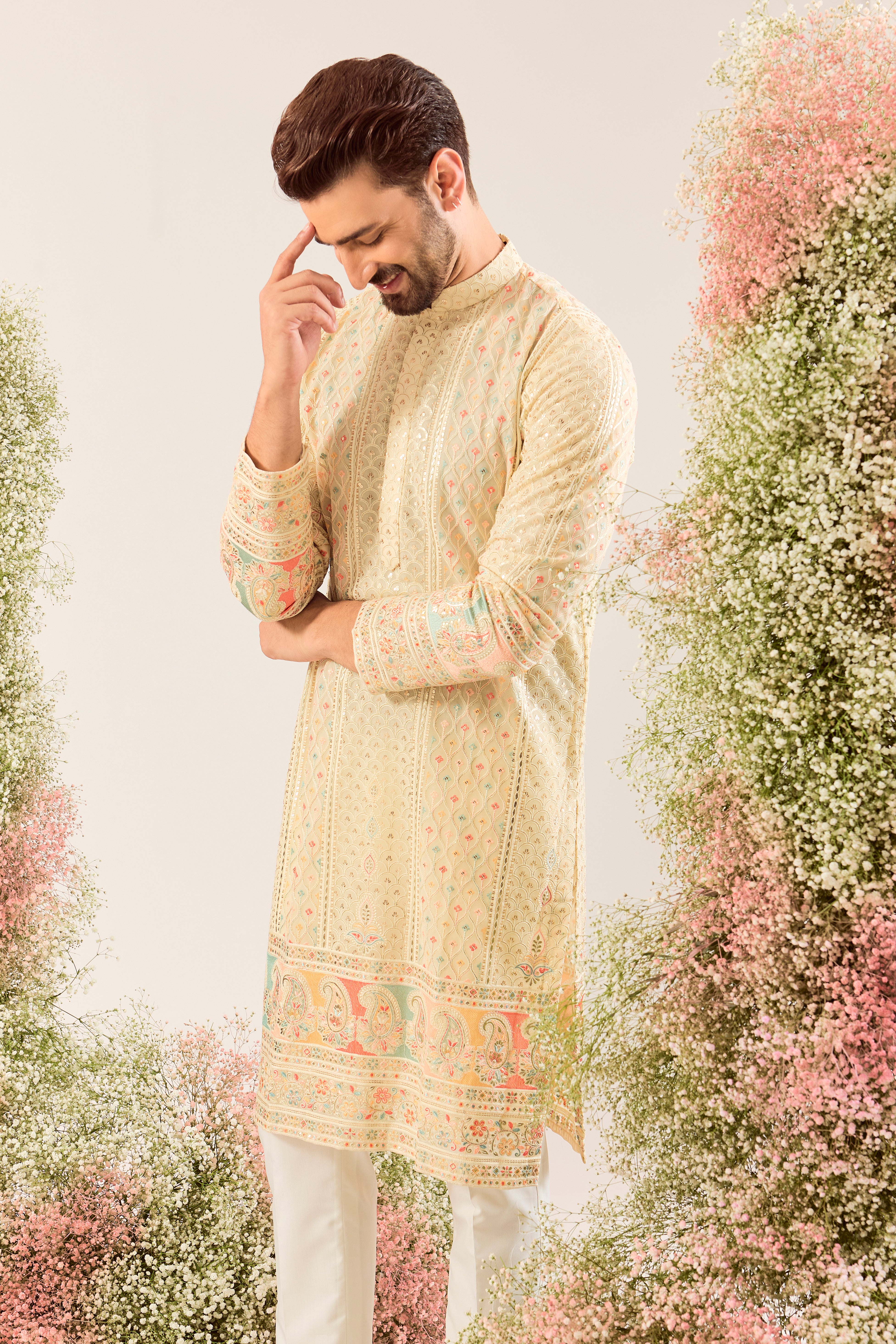 cream chikankari kurta with intricate multi colour threadwork and paisley emboridery