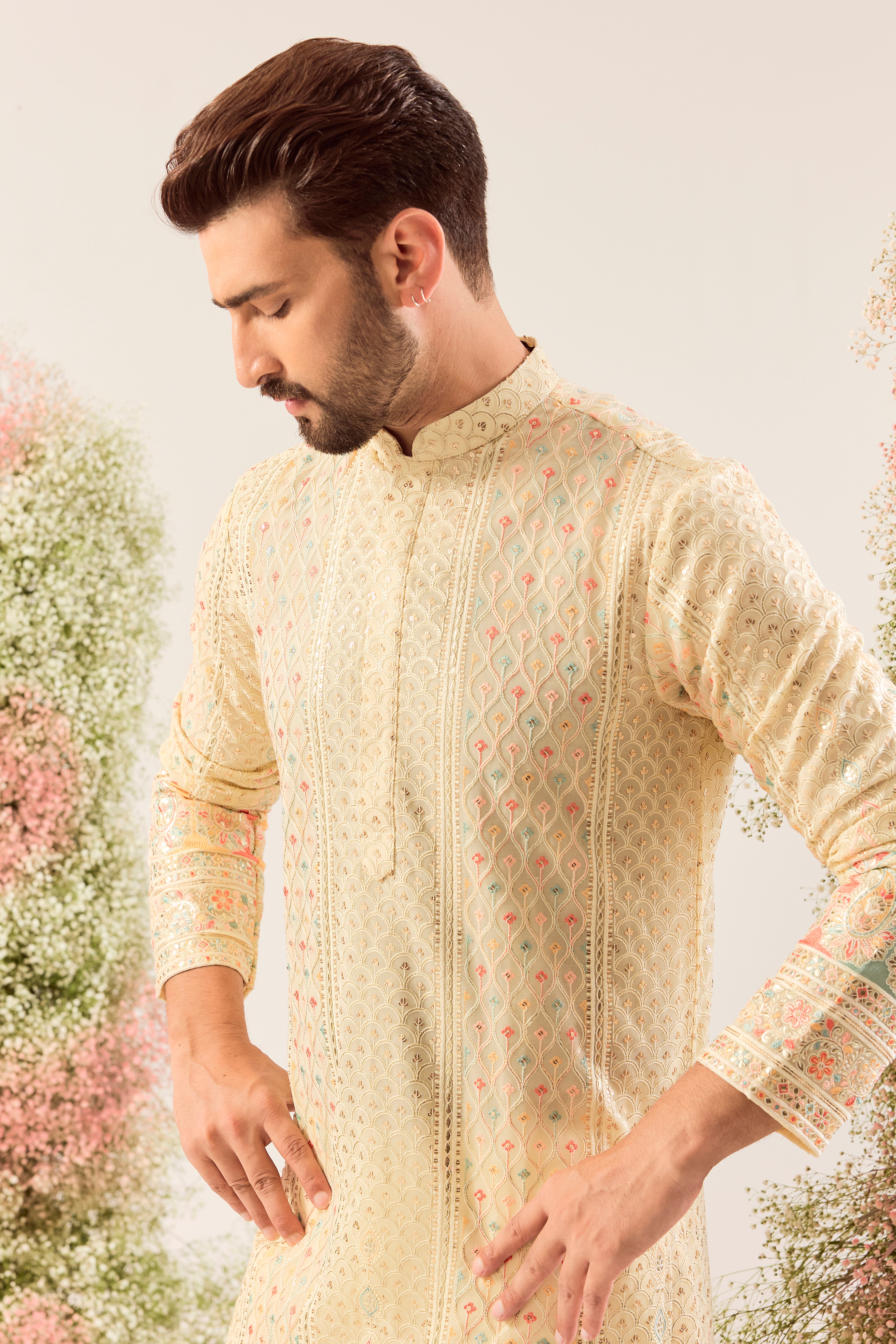 cream chikankari kurta with intricate multi colour threadwork and paisley emboridery