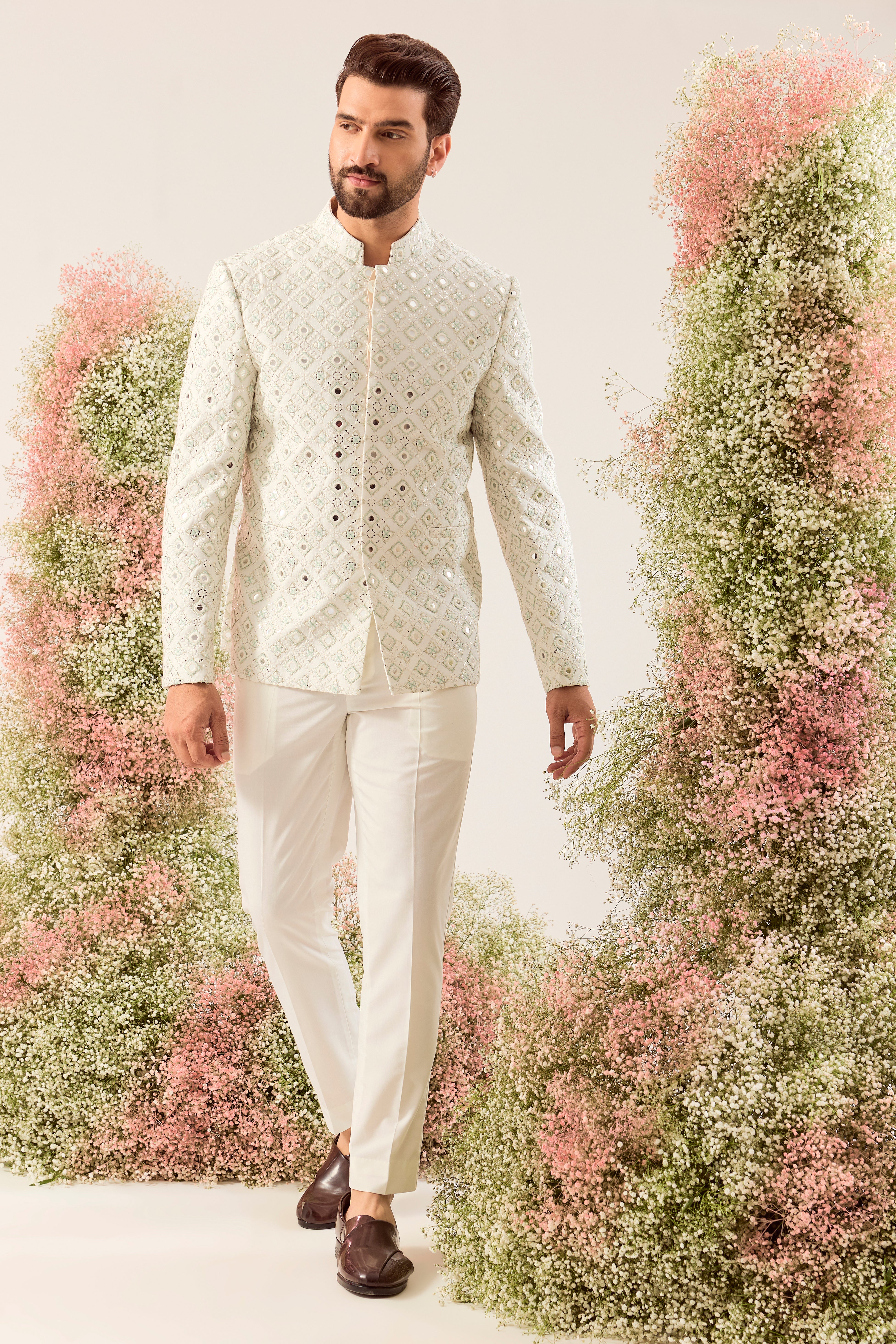 our signature white mirror work bandgala with intricate aqua thread work and sequin details