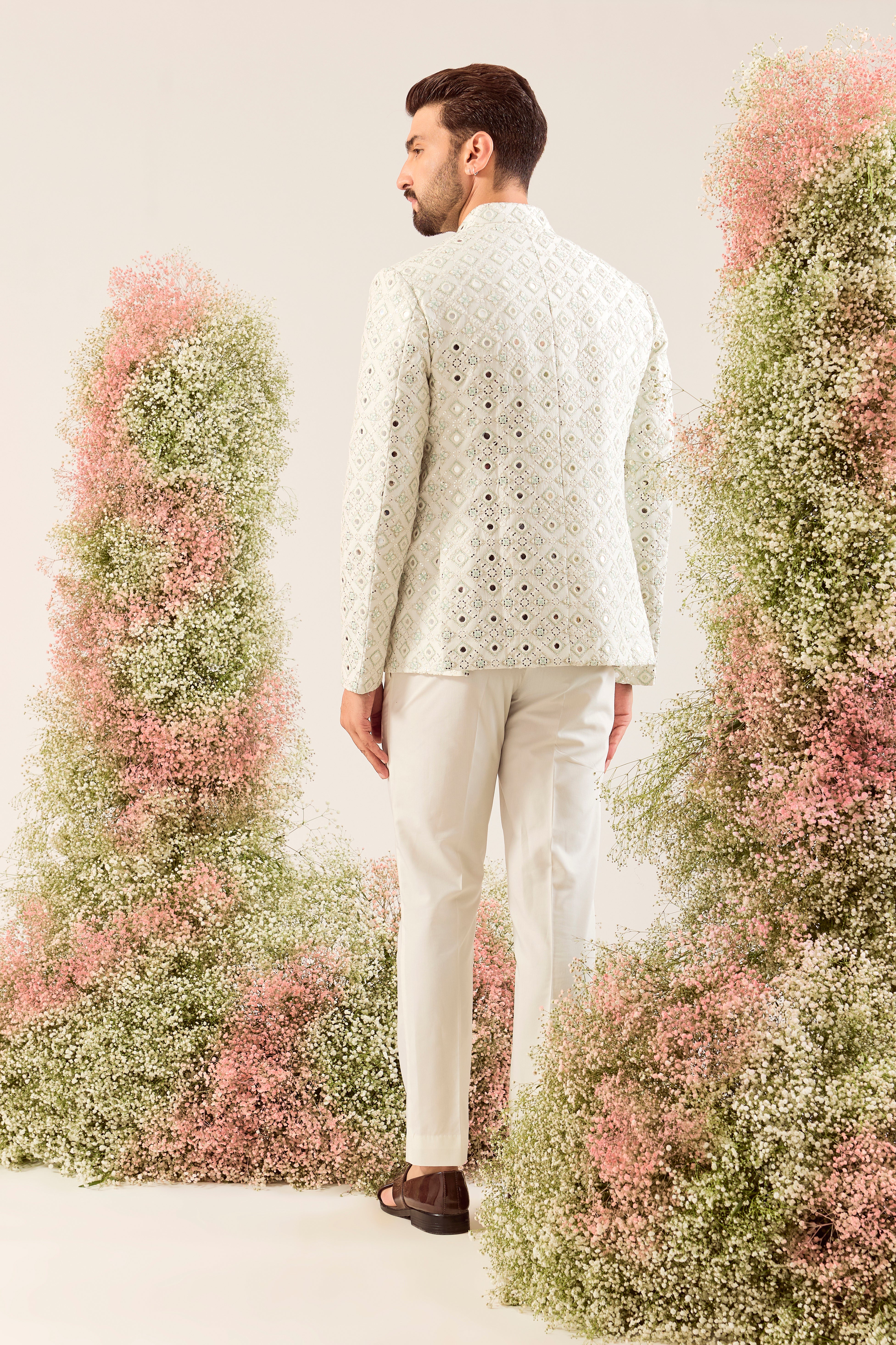 our signature white mirror work bandgala with intricate aqua thread work and sequin details