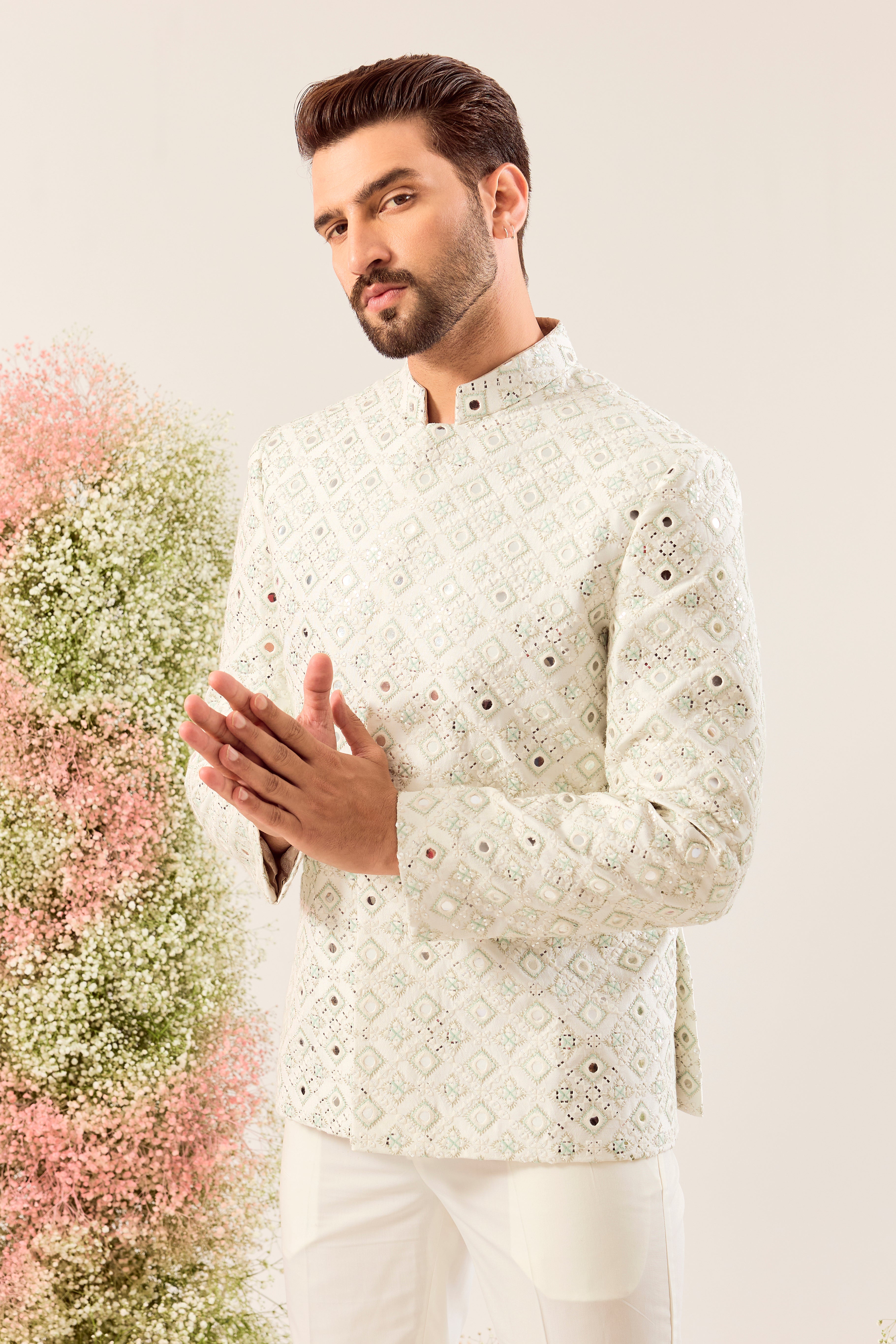 our signature white mirror work bandgala with intricate aqua thread work and sequin details